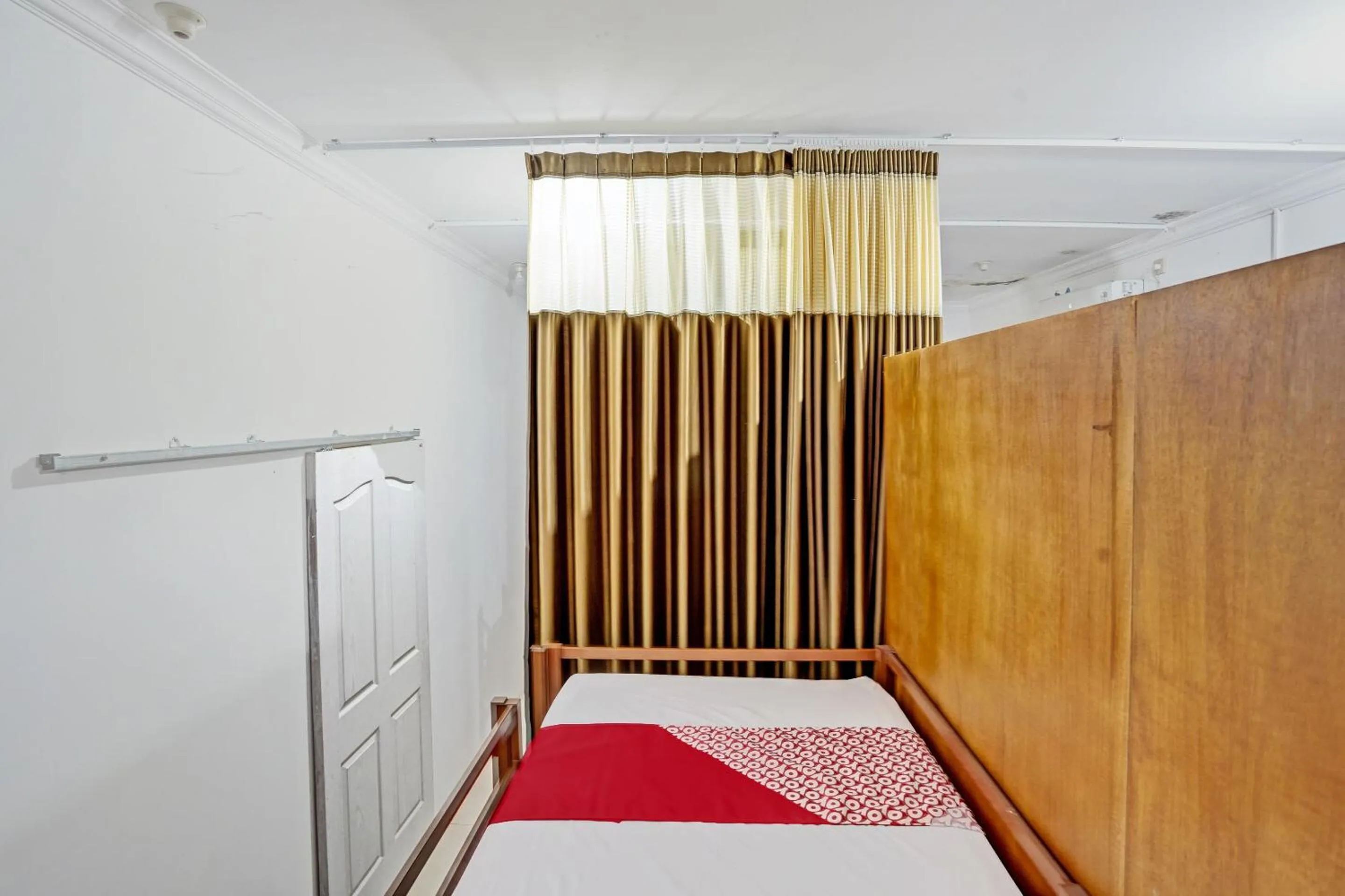 Bedroom in OYO 92736 Bougenville Rover