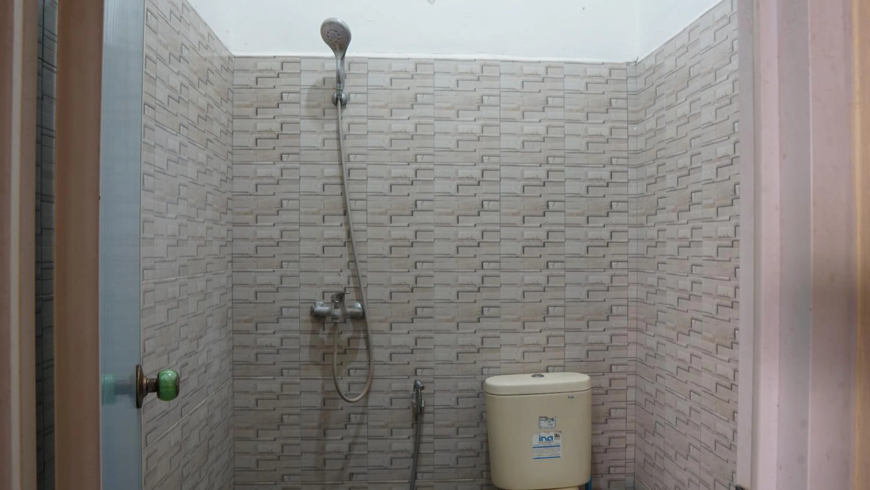 Bathroom in Hotel O Coconut Island Homestay & ResortNearPantai Pulau Merah