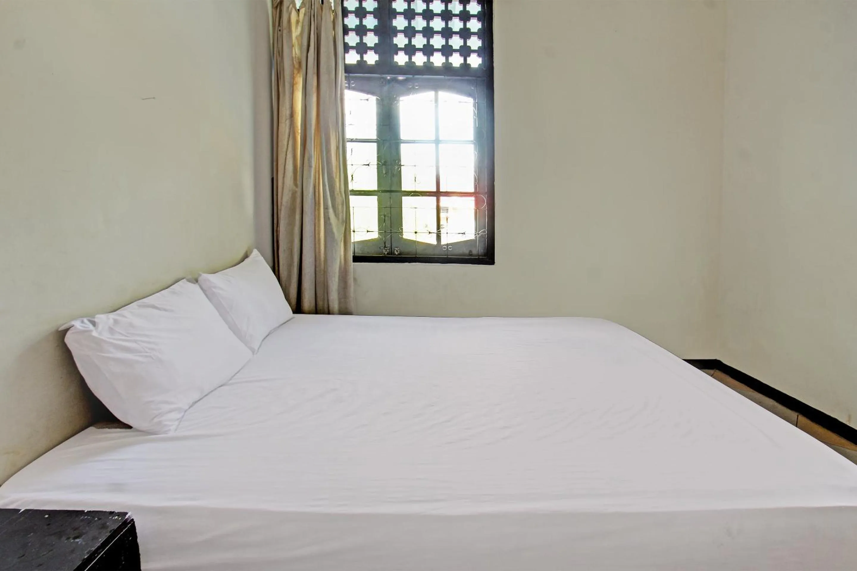 Bedroom in Hotel O Motel Langko