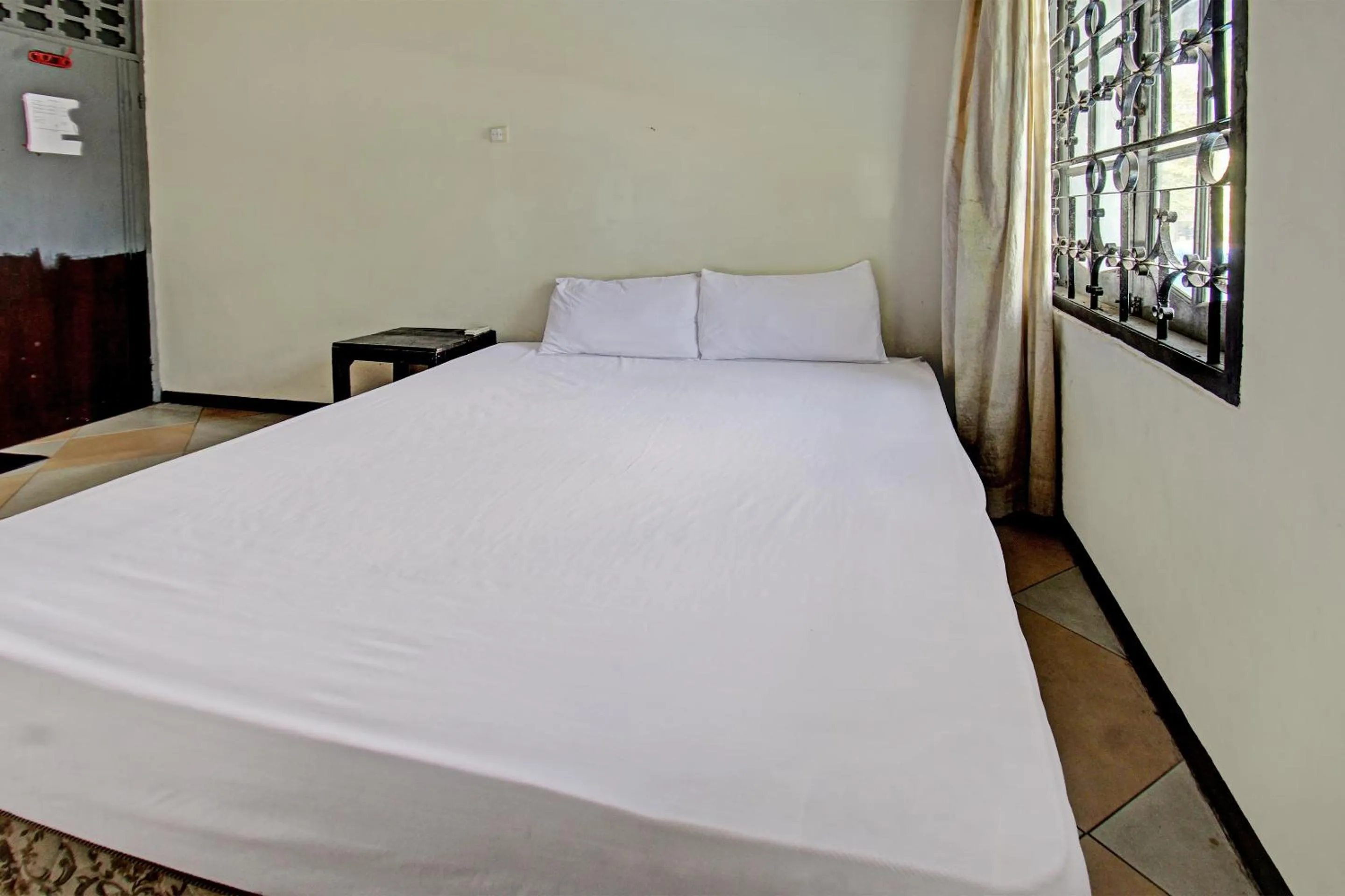 Bedroom in Hotel O Motel Langko