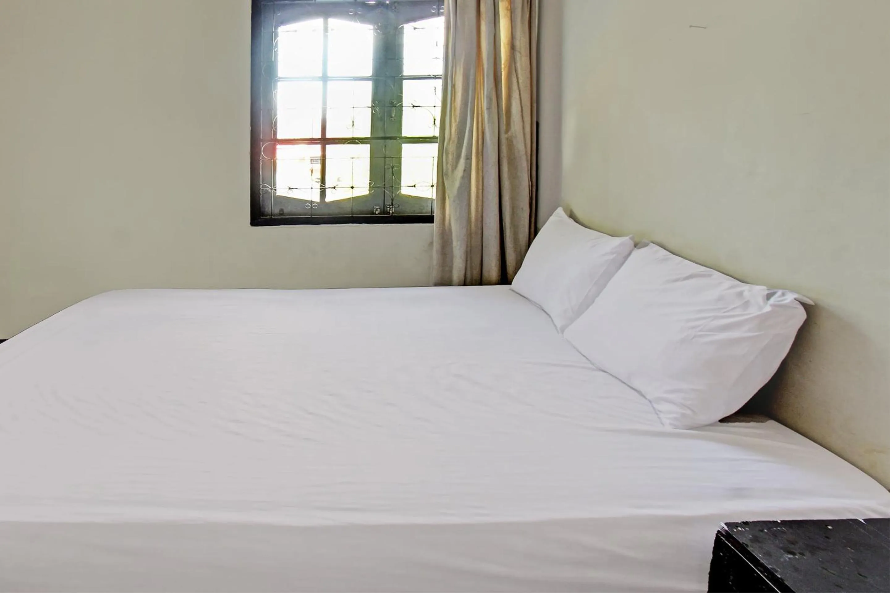 Bedroom in Hotel O Motel Langko