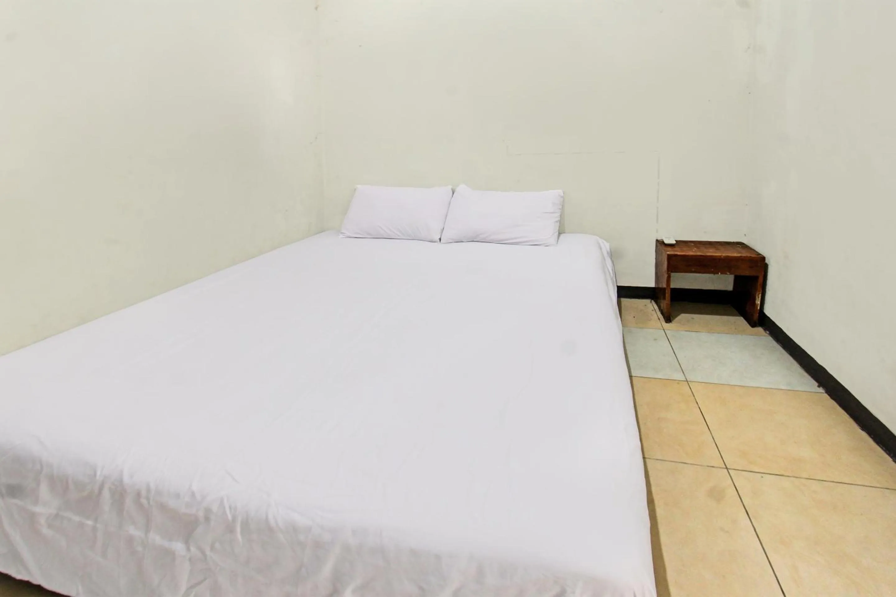 Bedroom in Hotel O Motel Langko