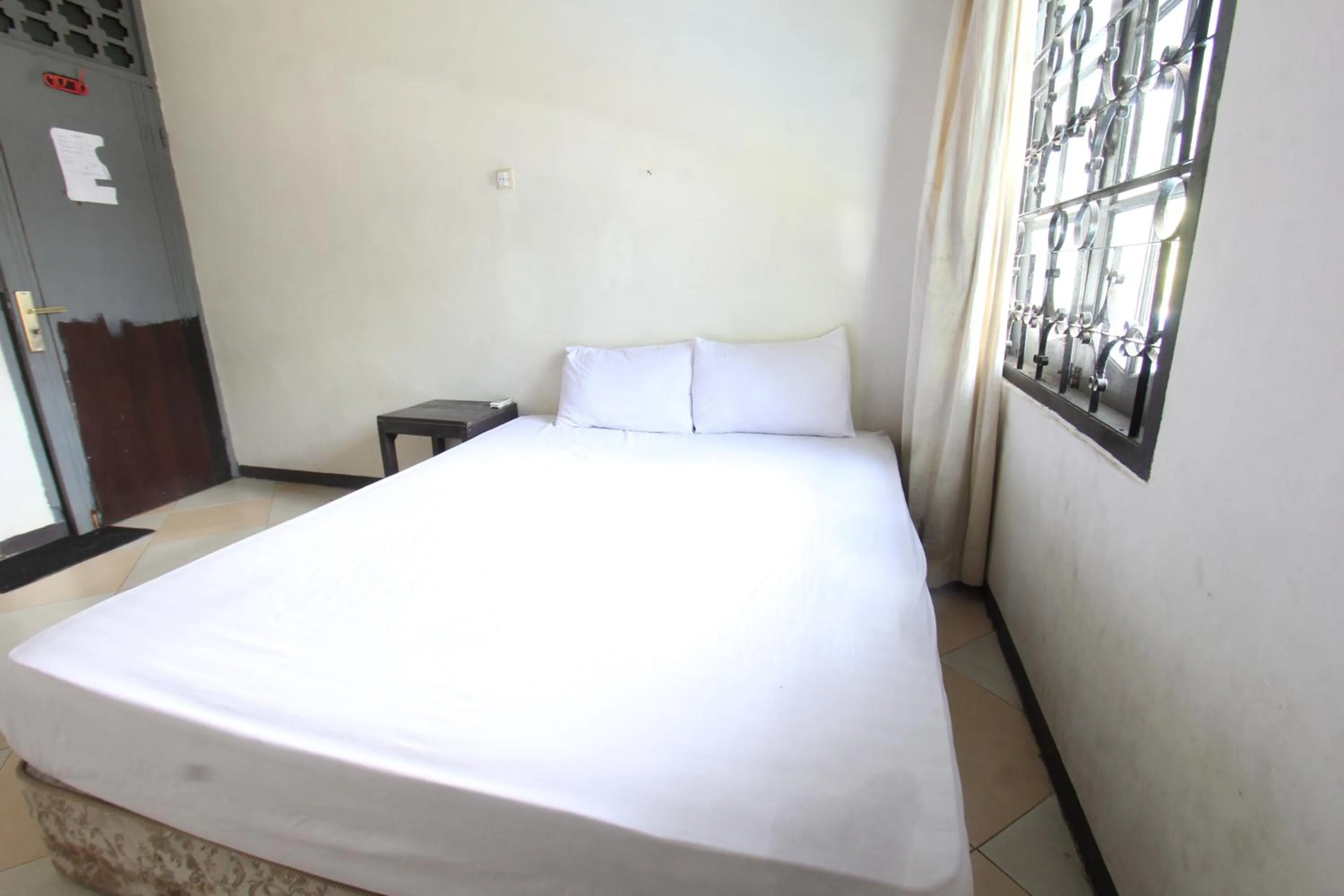 Bedroom in Hotel O Motel Langko