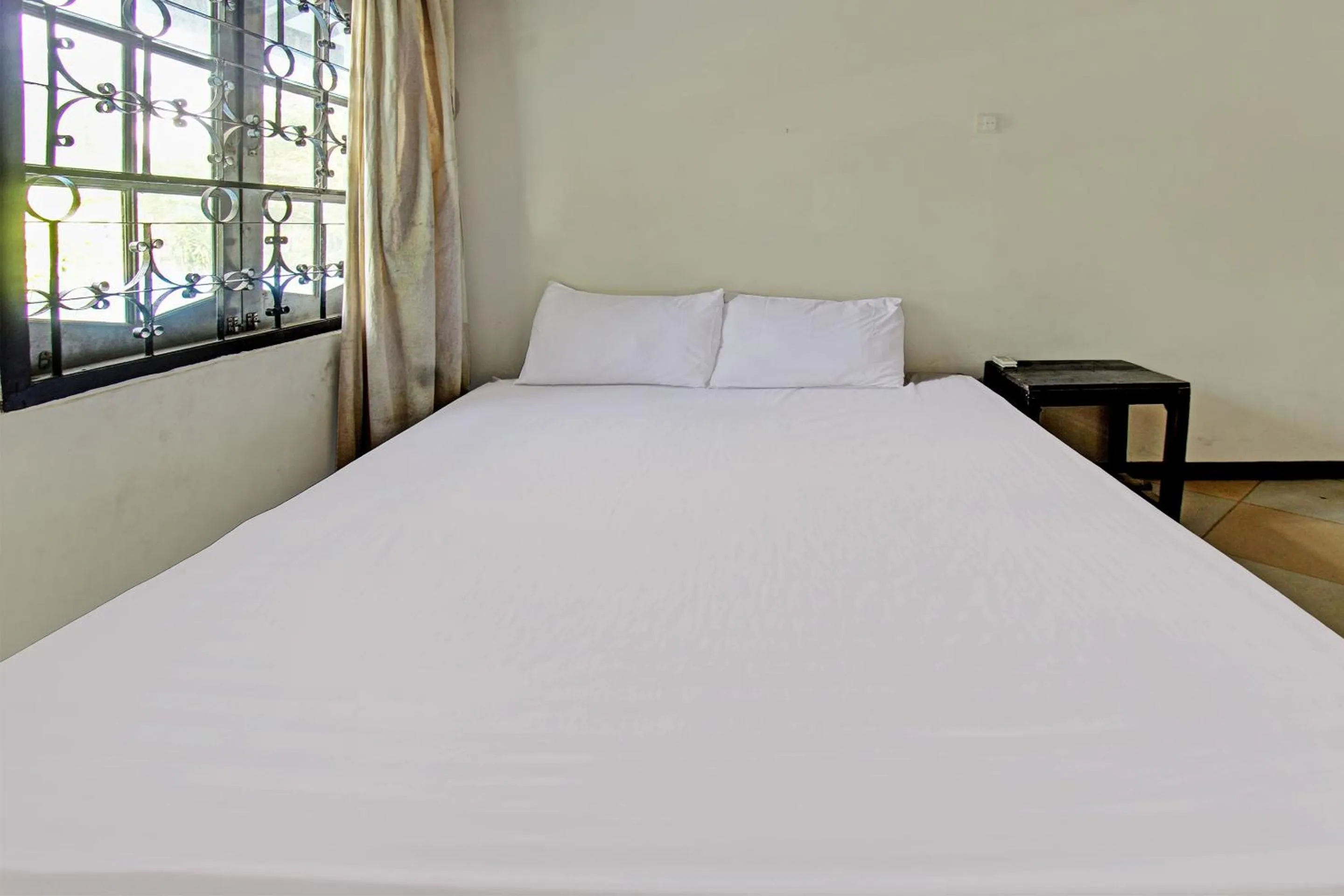 Bedroom in Hotel O Motel Langko