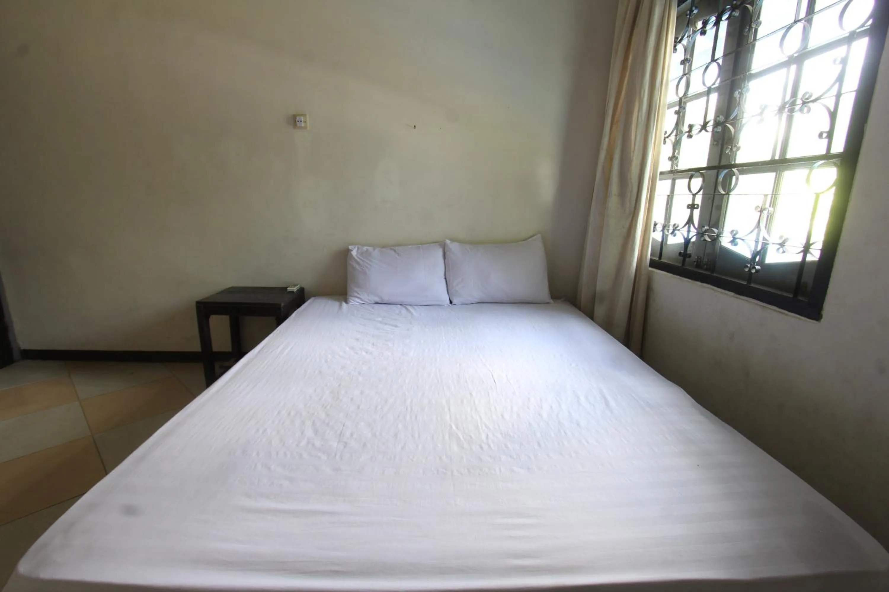 Bedroom in Hotel O Motel Langko