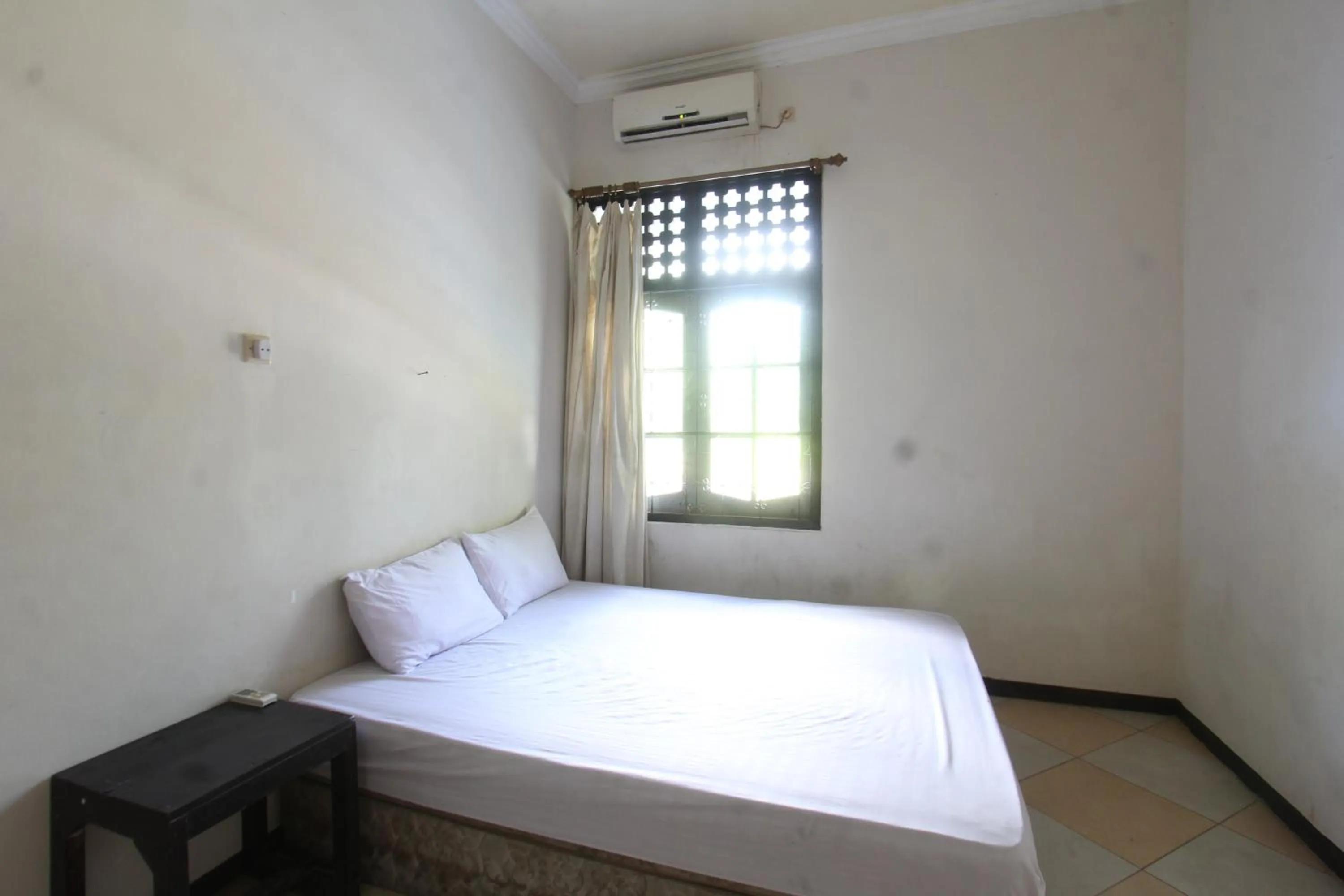 Bedroom in Hotel O Motel Langko