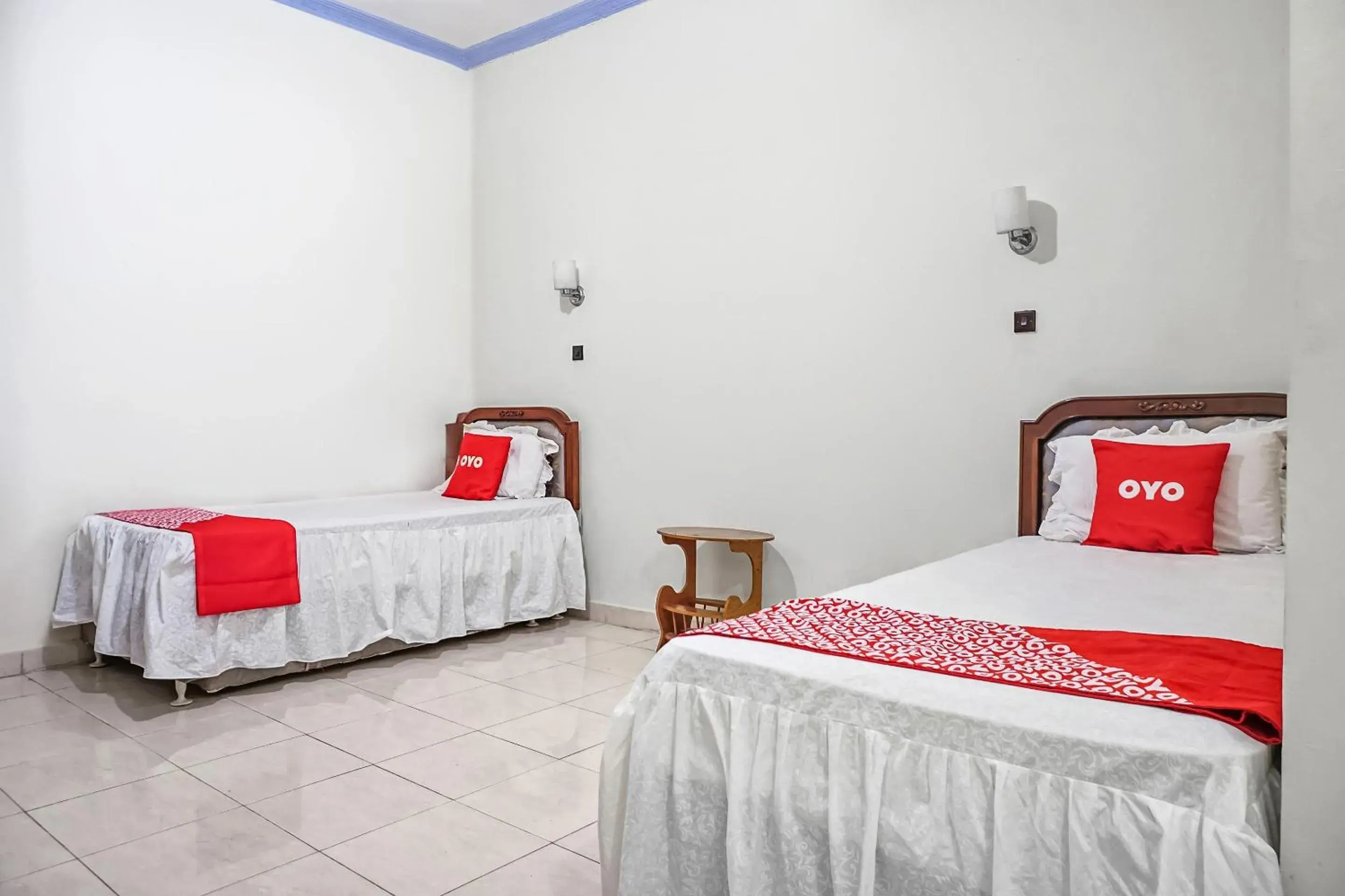 Standard Twin Room in Hotel O Wisma Pundu Syariah Near Kantor Camat Kota Besi Standard Twin Room in Hotel O Wisma Pundu Syariah Near Kantor Camat Kota Besi