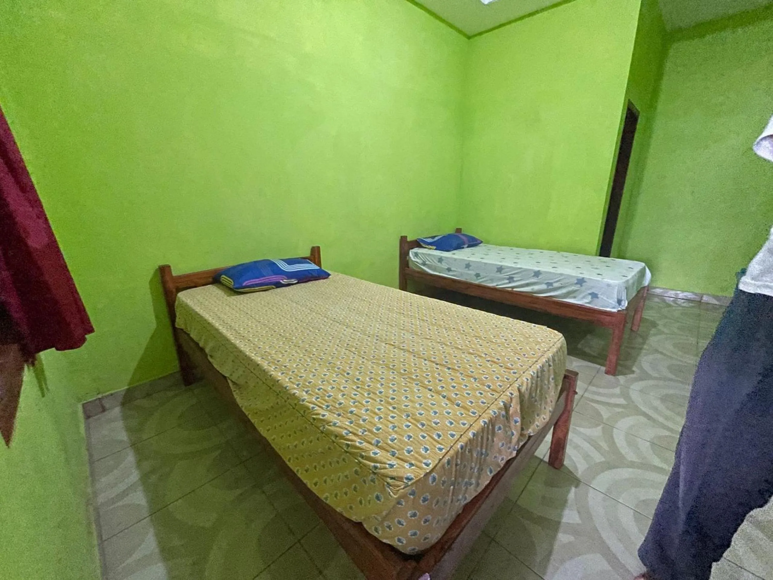 Bedroom in Hotel O Penginapan Asoka Indah Near PT. PLN (persero) Gardu Induk Barru