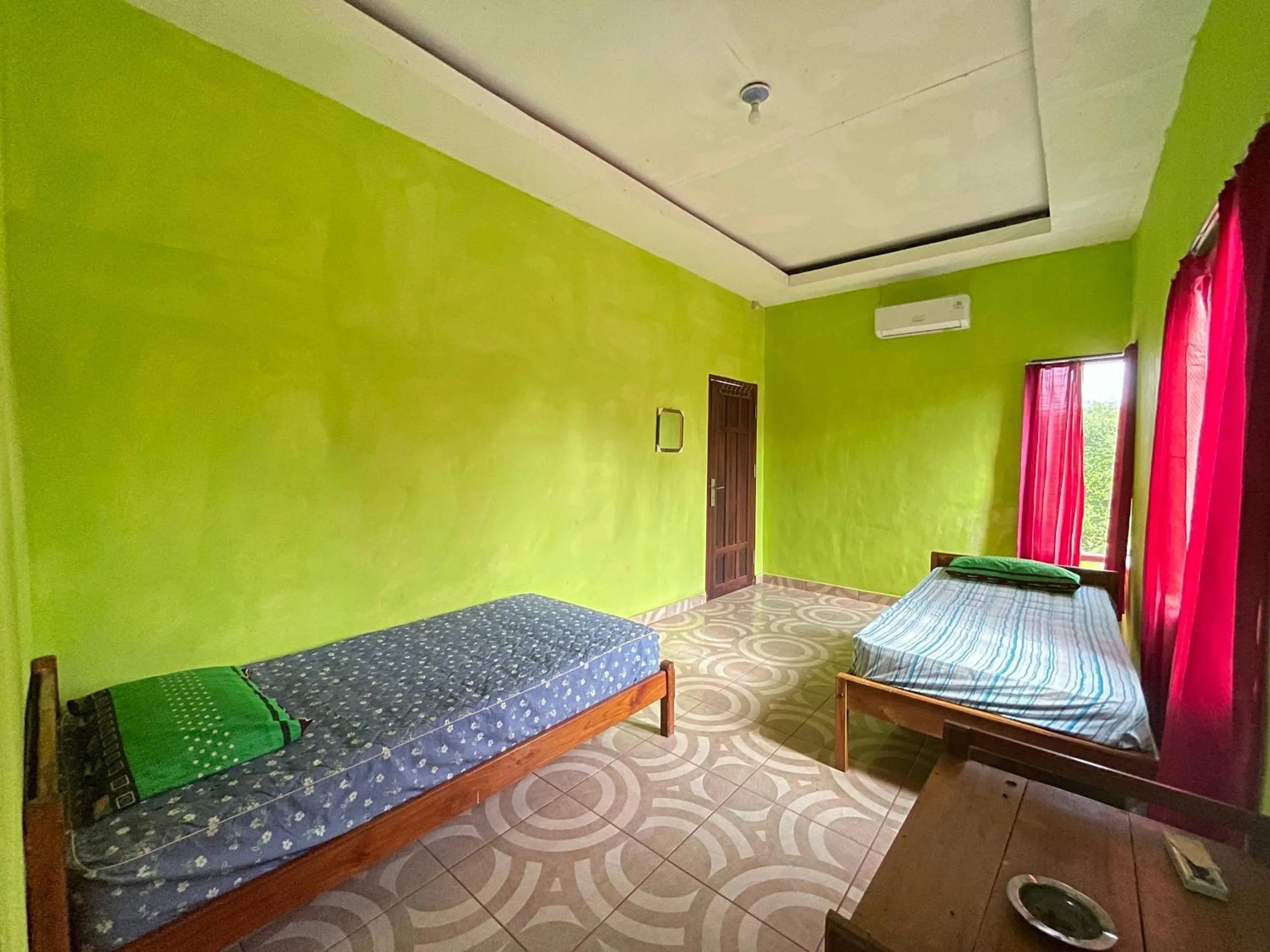 Bedroom in Hotel O Penginapan Asoka Indah Near PT. PLN (persero) Gardu Induk Barru