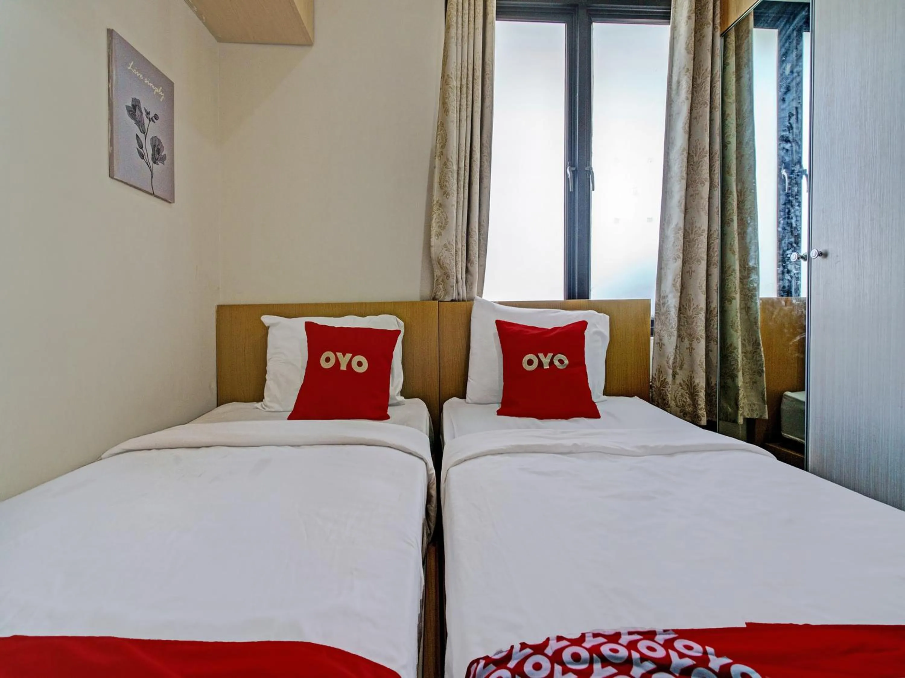 Bedroom in Hotel O Losmen Diah Syariah