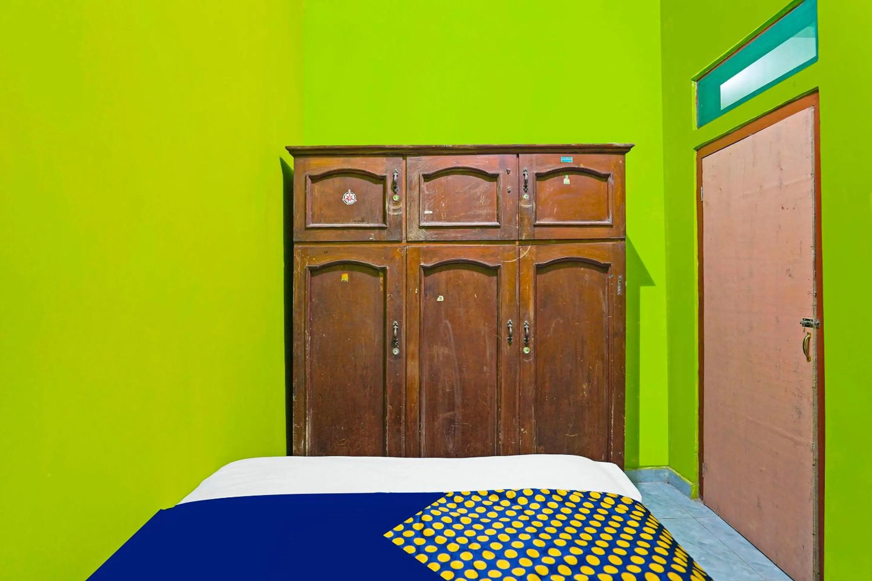 Bedroom in Hotel O Homestay Barokah