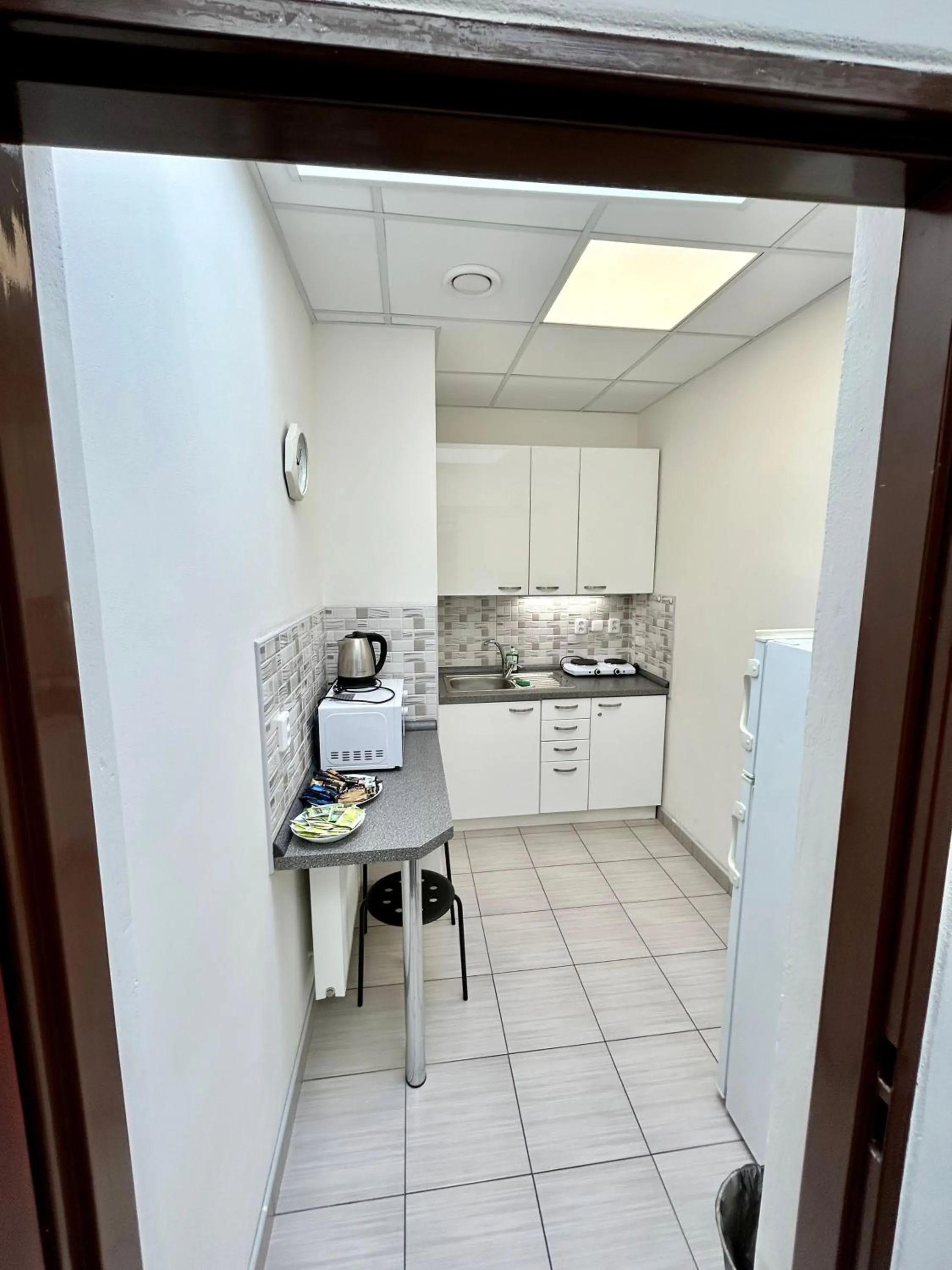 Kitchen or kitchenette in Powder Tower Suites
