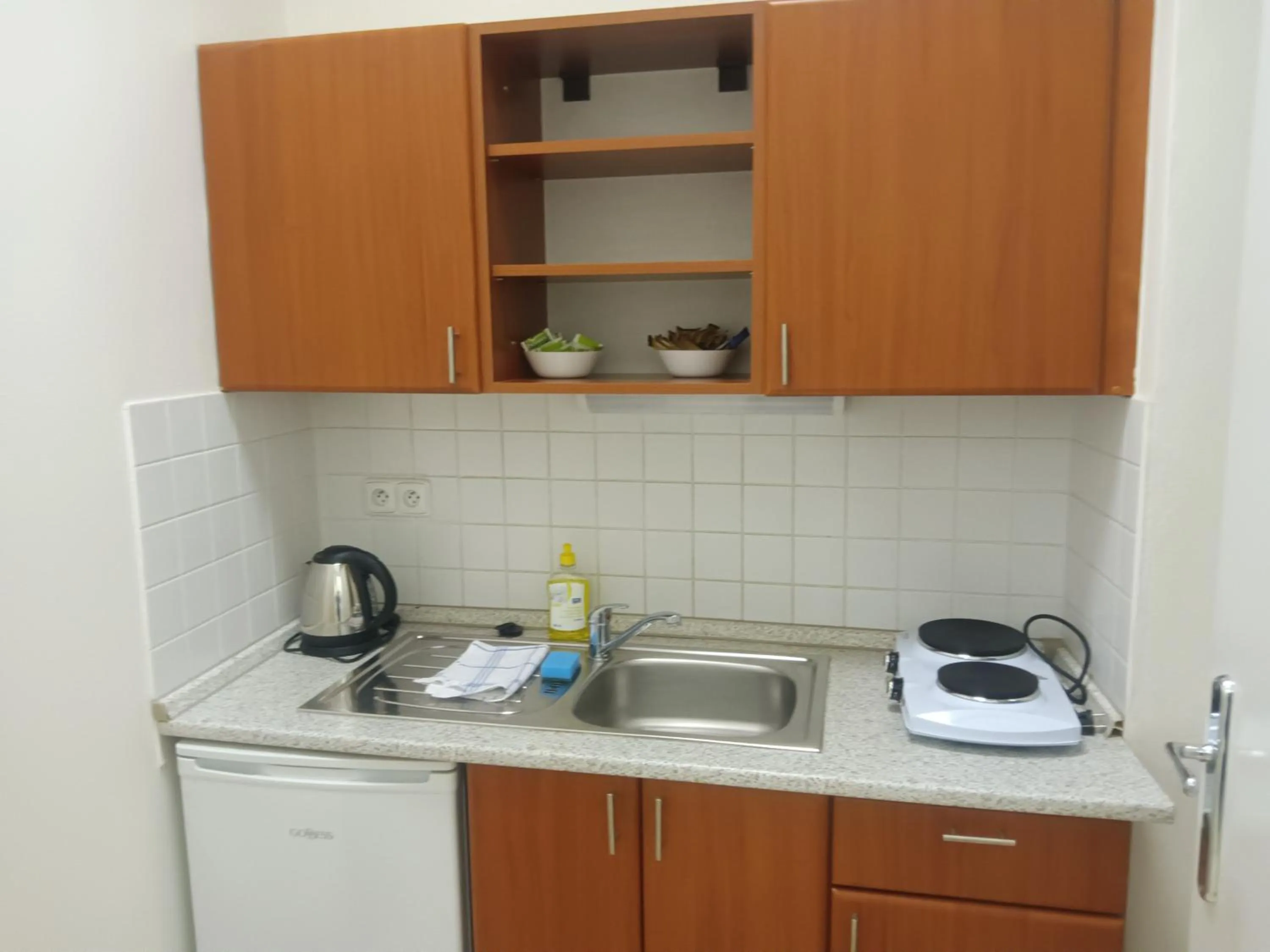 Kitchen or kitchenette in Powder Tower Suites