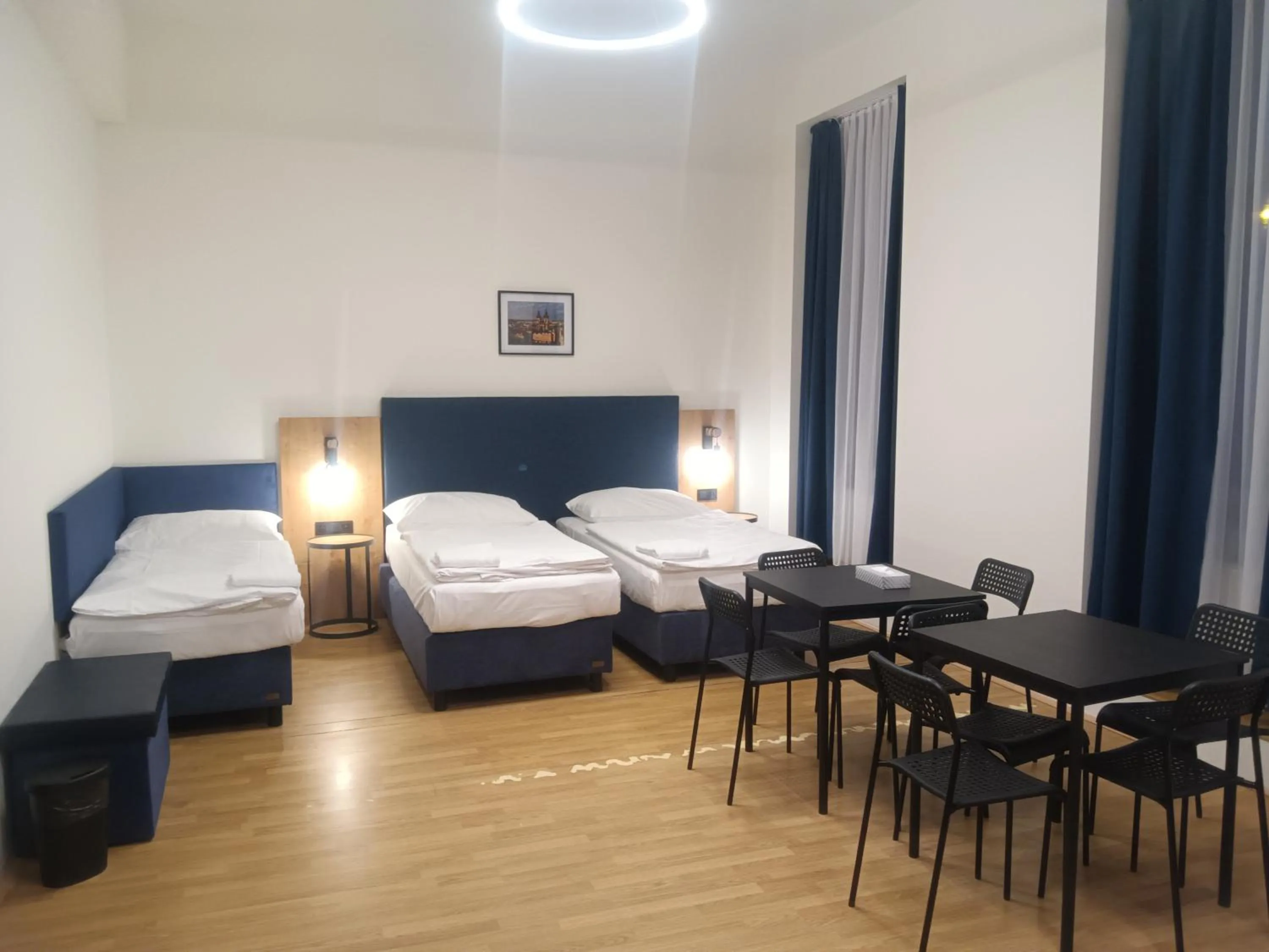 Seating area, Bed in Powder Tower Suites