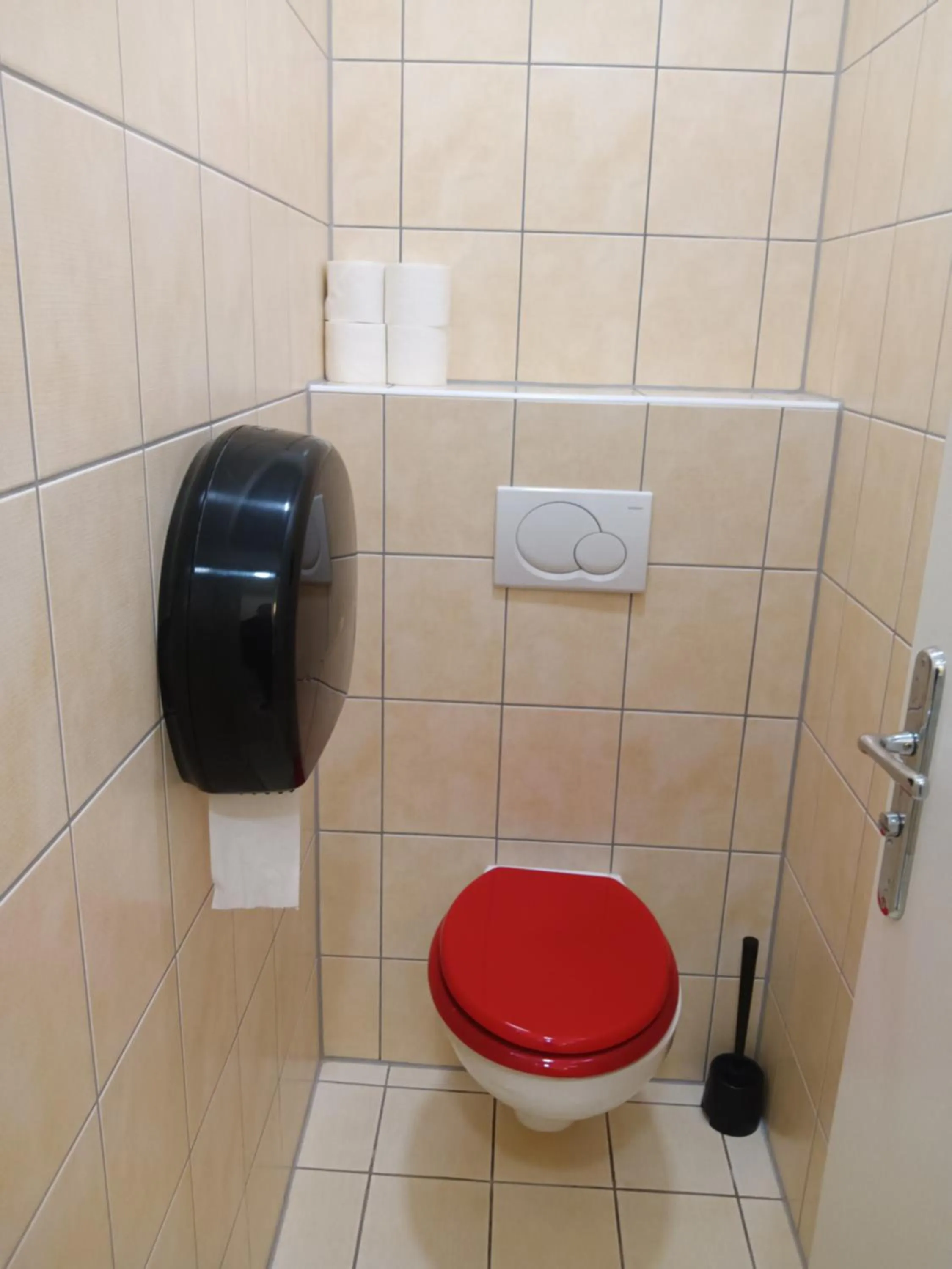 Toilet in Powder Tower Suites