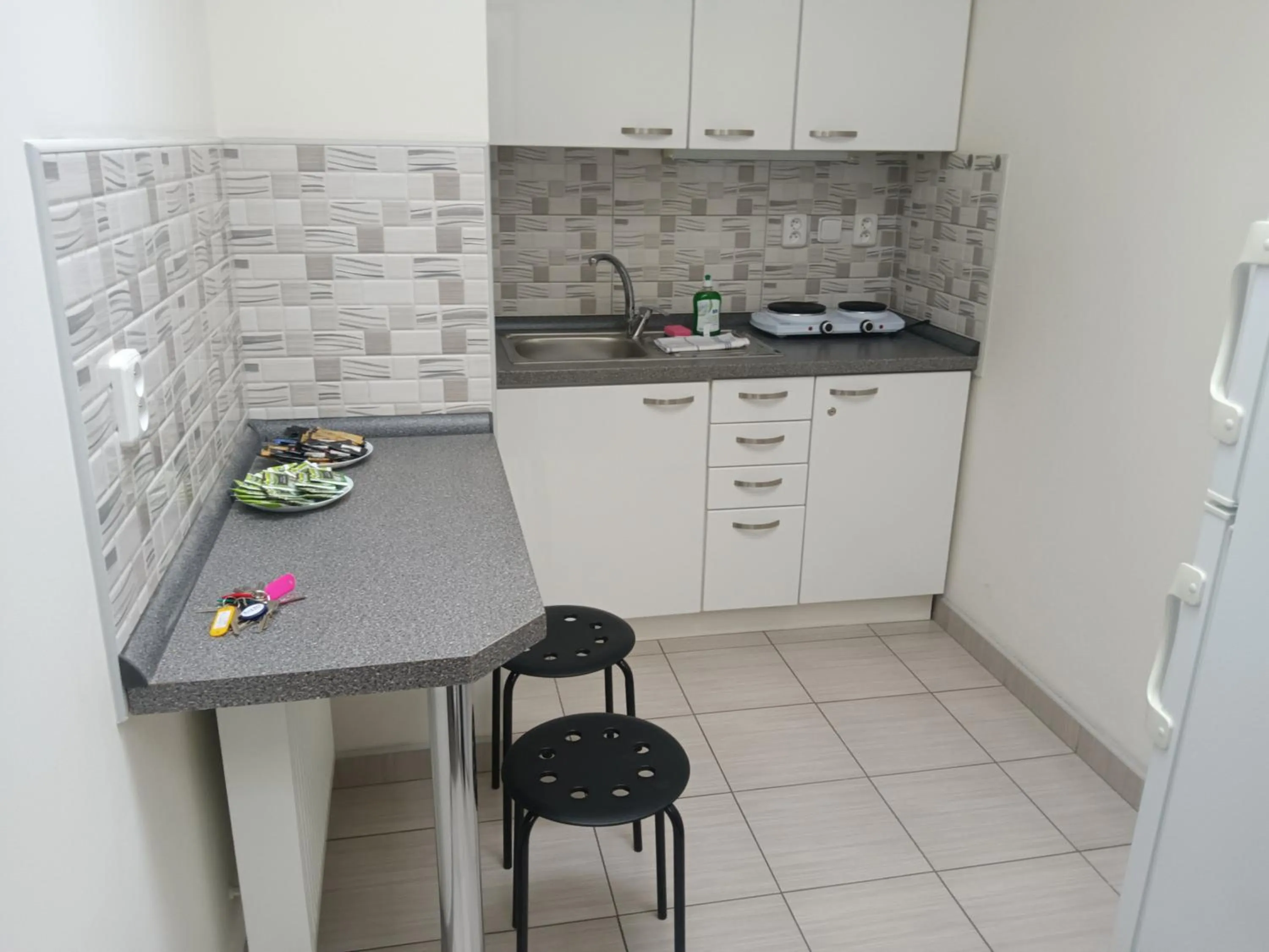 Kitchen or kitchenette in Powder Tower Suites