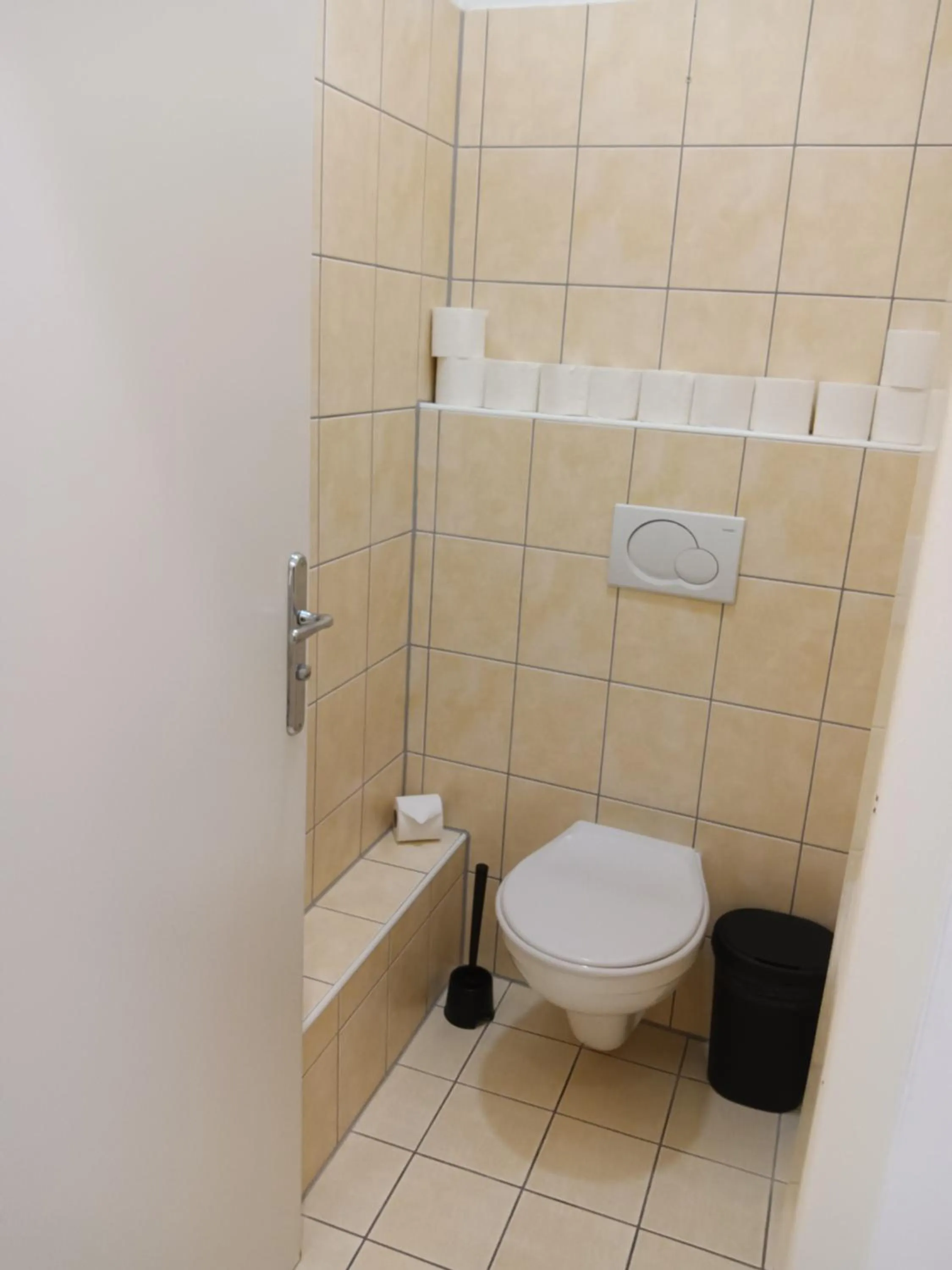 Toilet in Powder Tower Suites