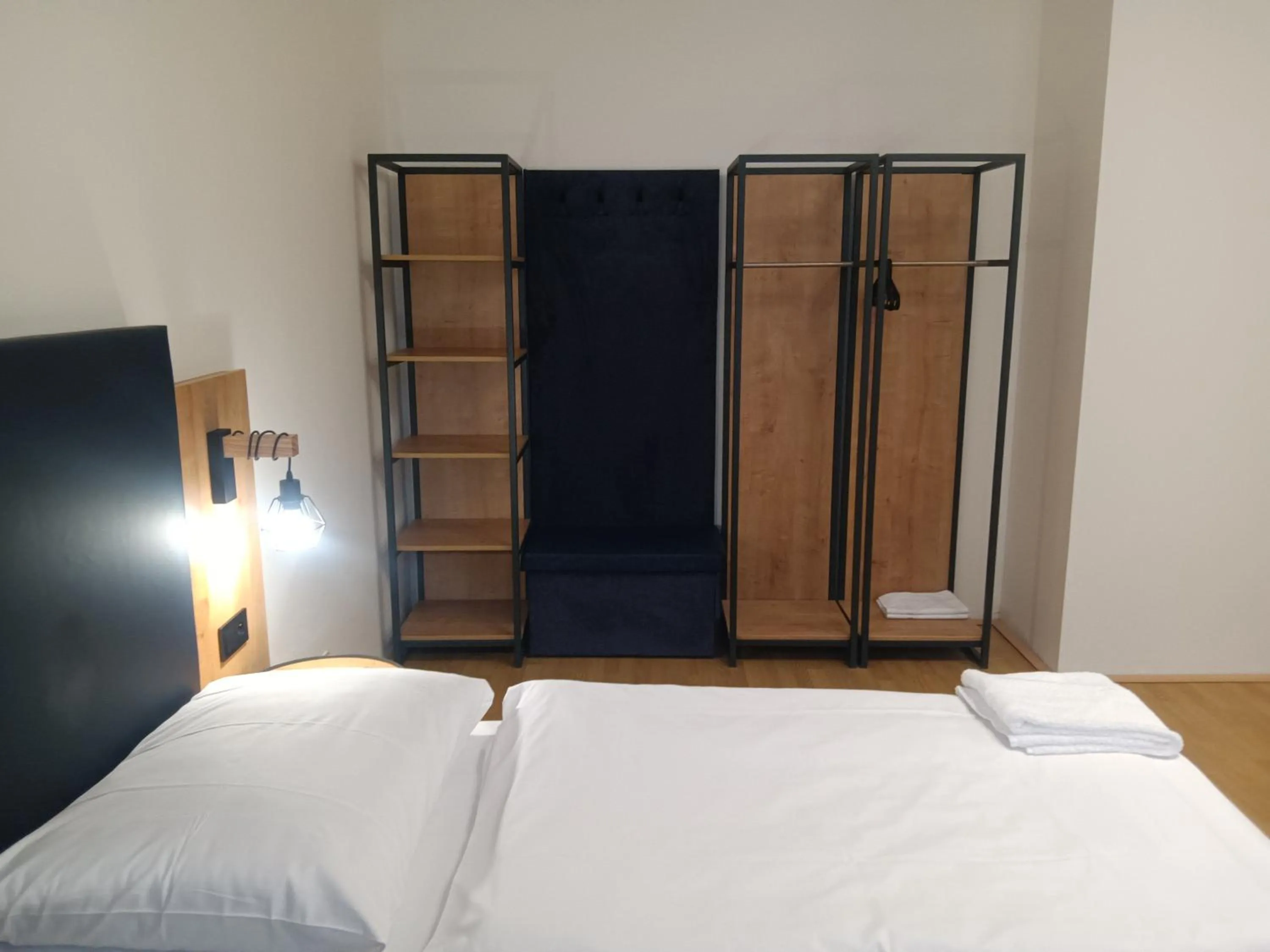 wardrobe, Bed in Powder Tower Suites