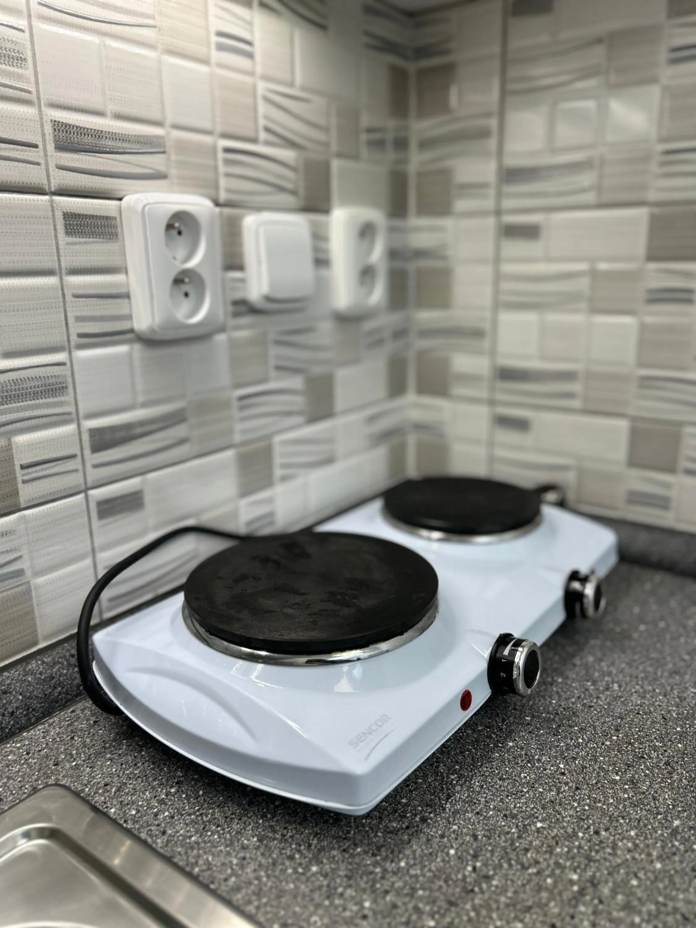 Kitchen or kitchenette in Powder Tower Suites