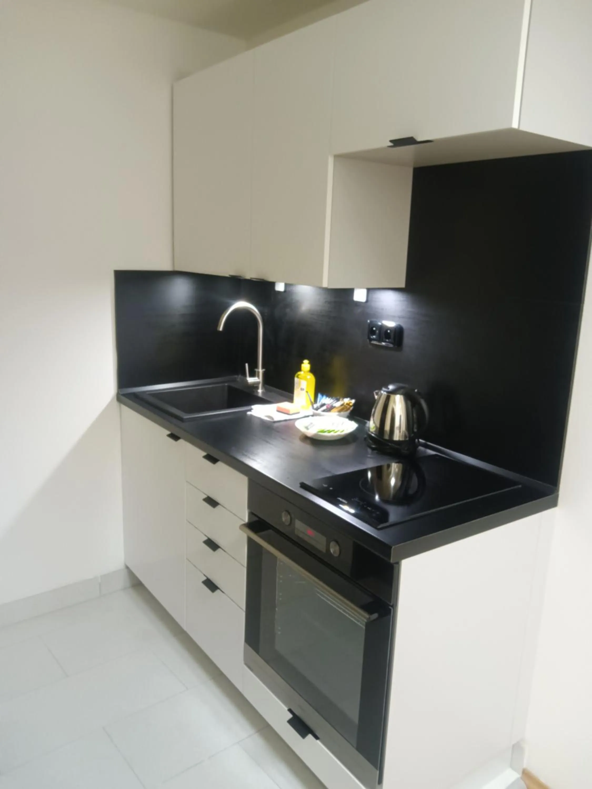 Kitchen or kitchenette in Powder Tower Suites