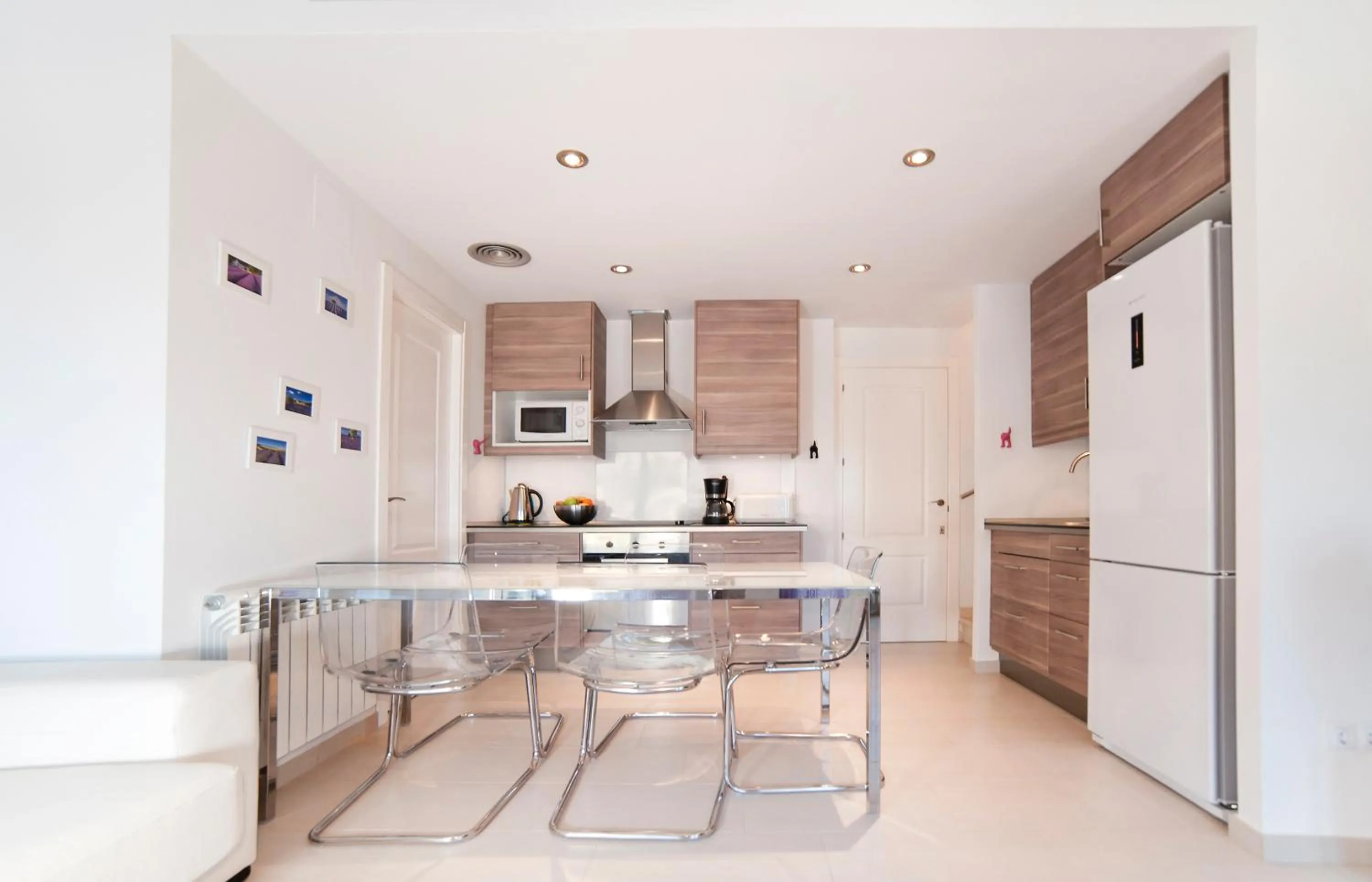 Kitchen or kitchenette in Modern Duplex in Sitges with Private Parking, Sea Views & Terrace