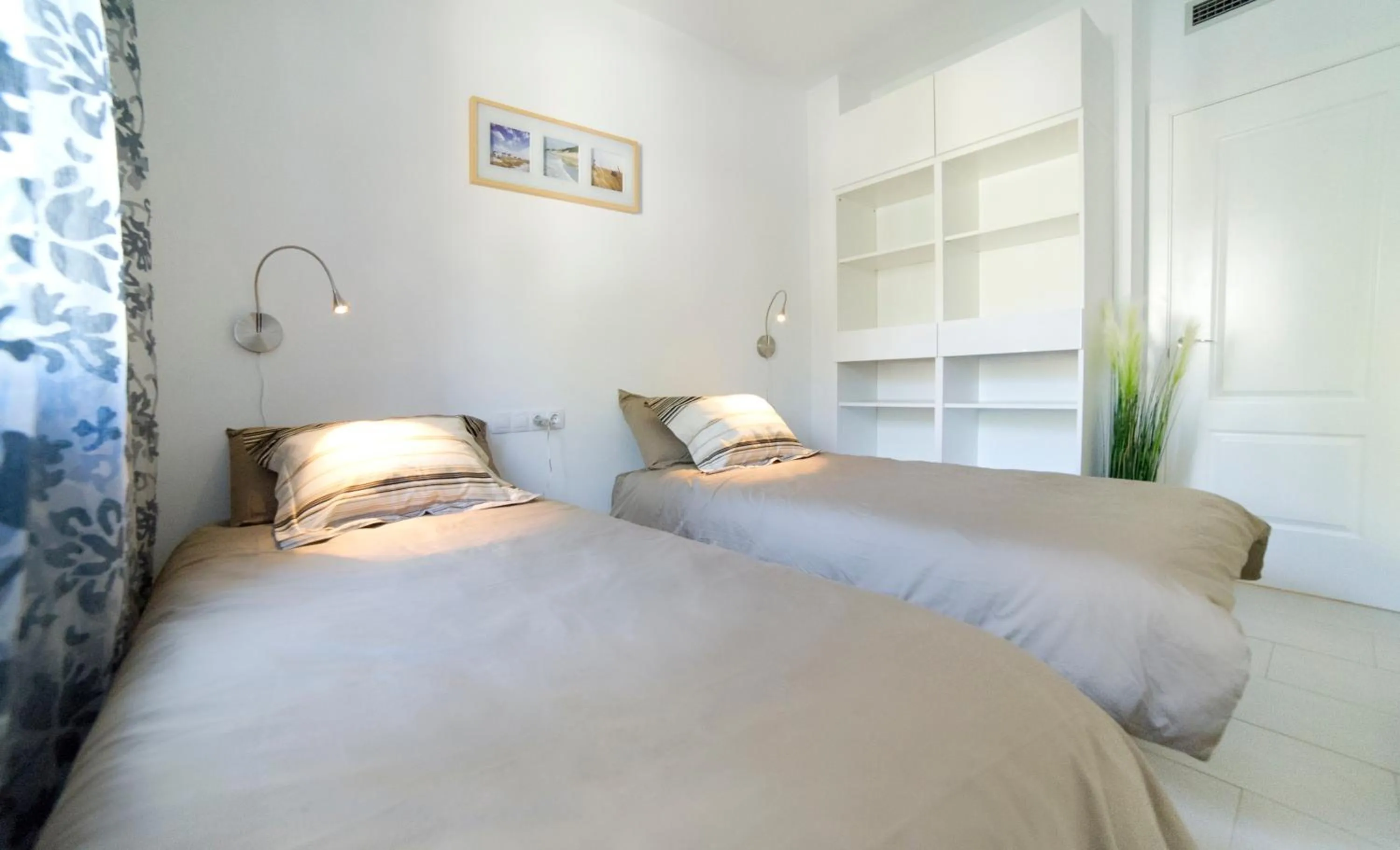 Bed in Modern Duplex in Sitges with Private Parking, Sea Views & Terrace