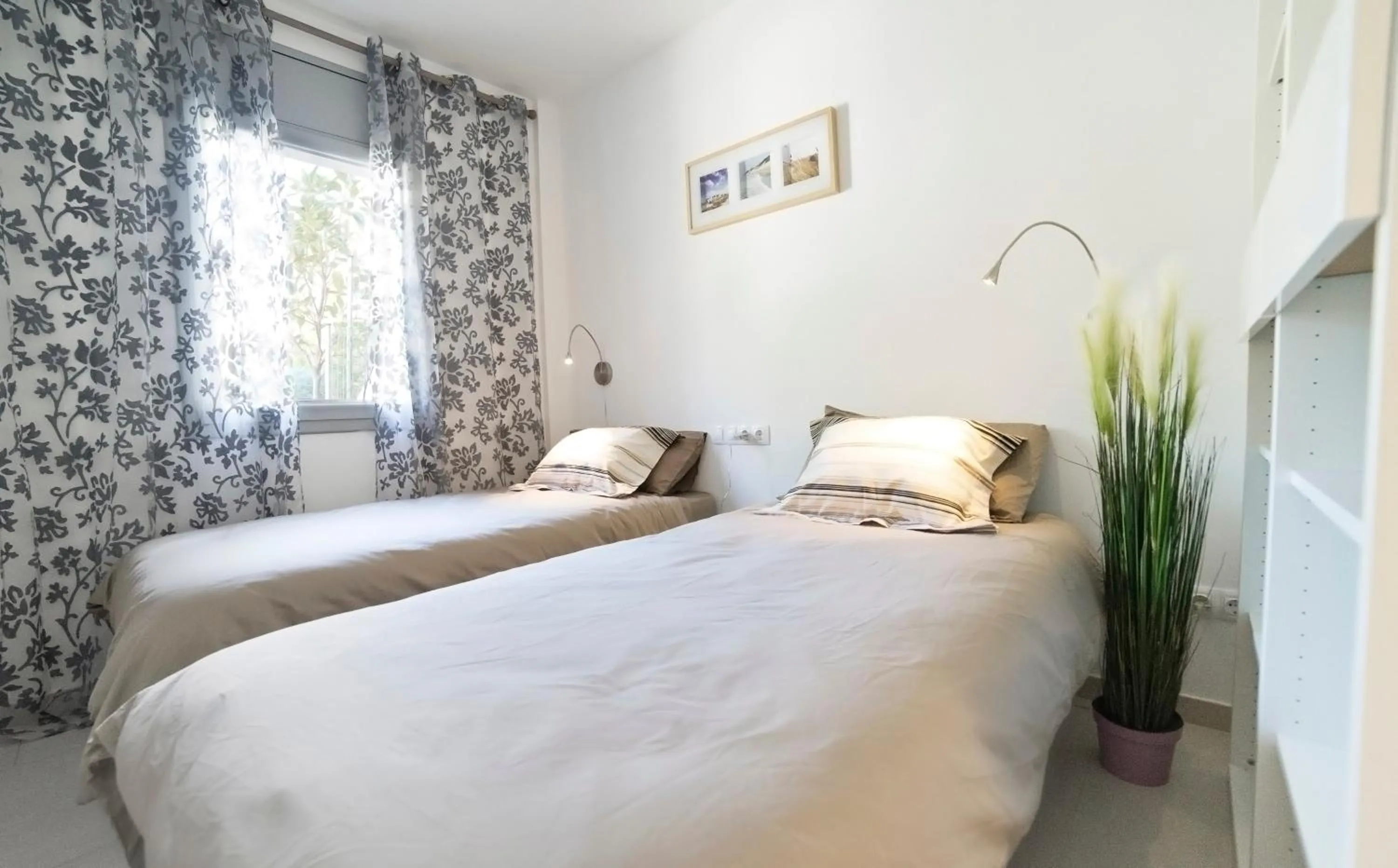 Bed in Modern Duplex in Sitges with Private Parking, Sea Views & Terrace