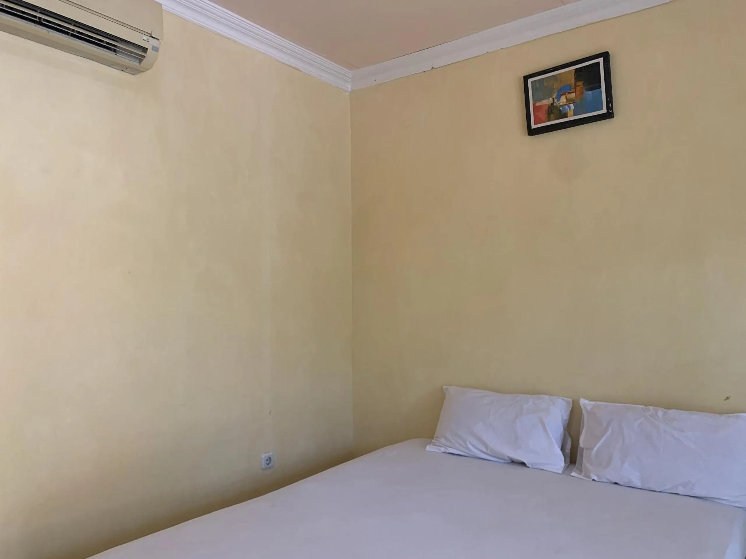 Bedroom, Bed in Hotel O Wisma Phinisi Syariah Near Mall of Pinrang Sejahtera