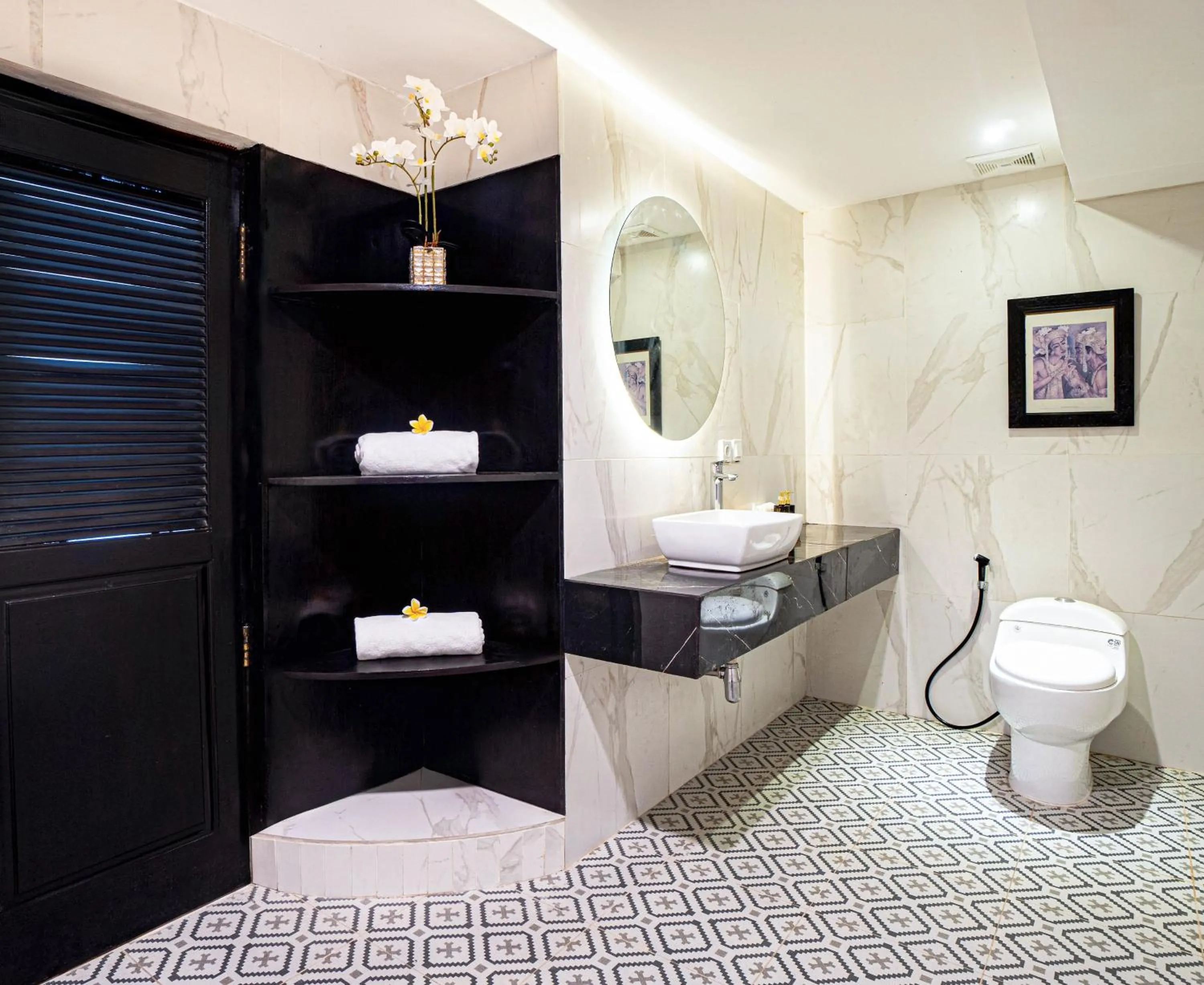 Bathroom in Casa Wina Kuta Managed by ARM Hospitality