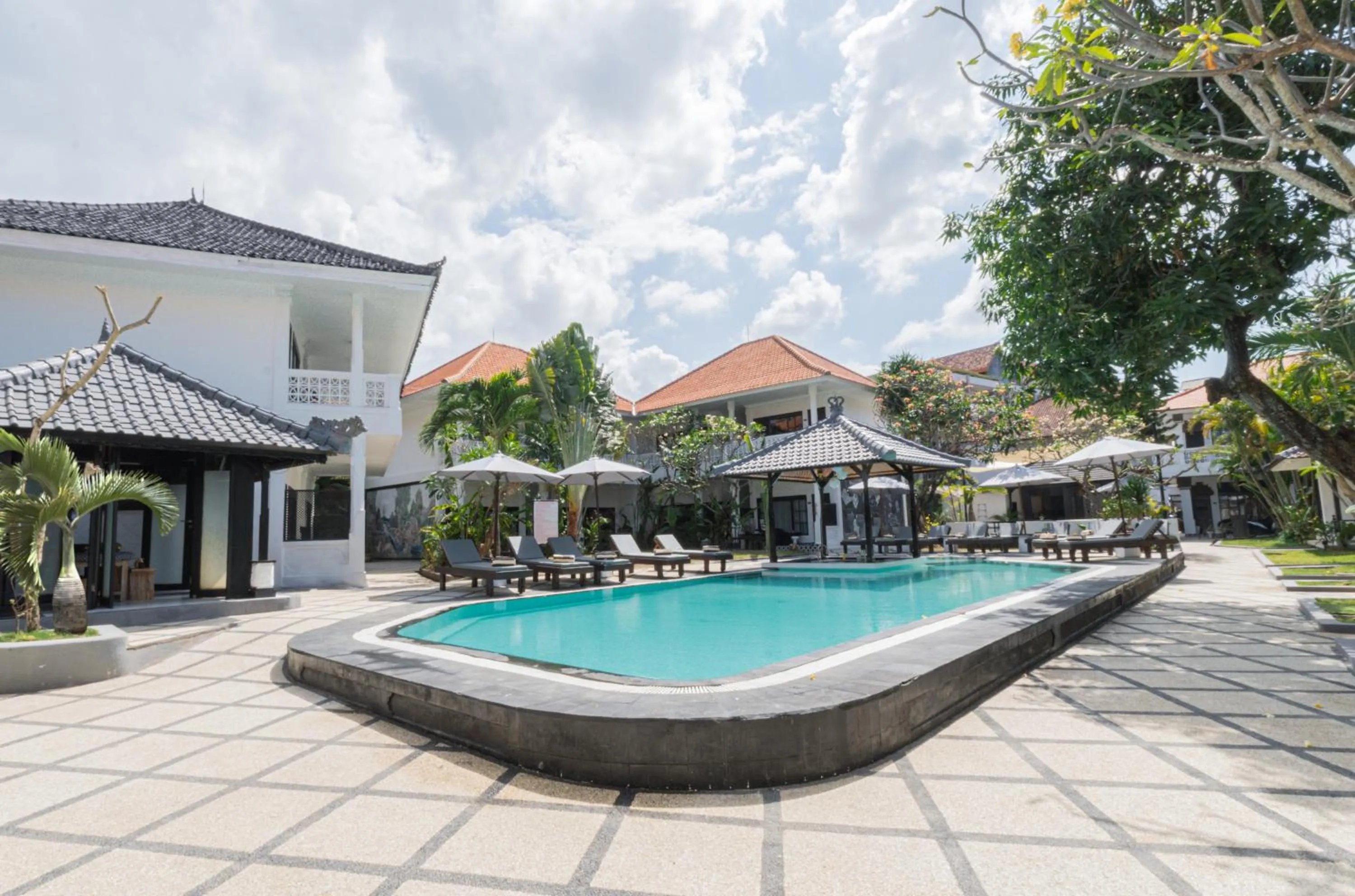 Swimming pool in Casa Wina Kuta Managed by ARM Hospitality