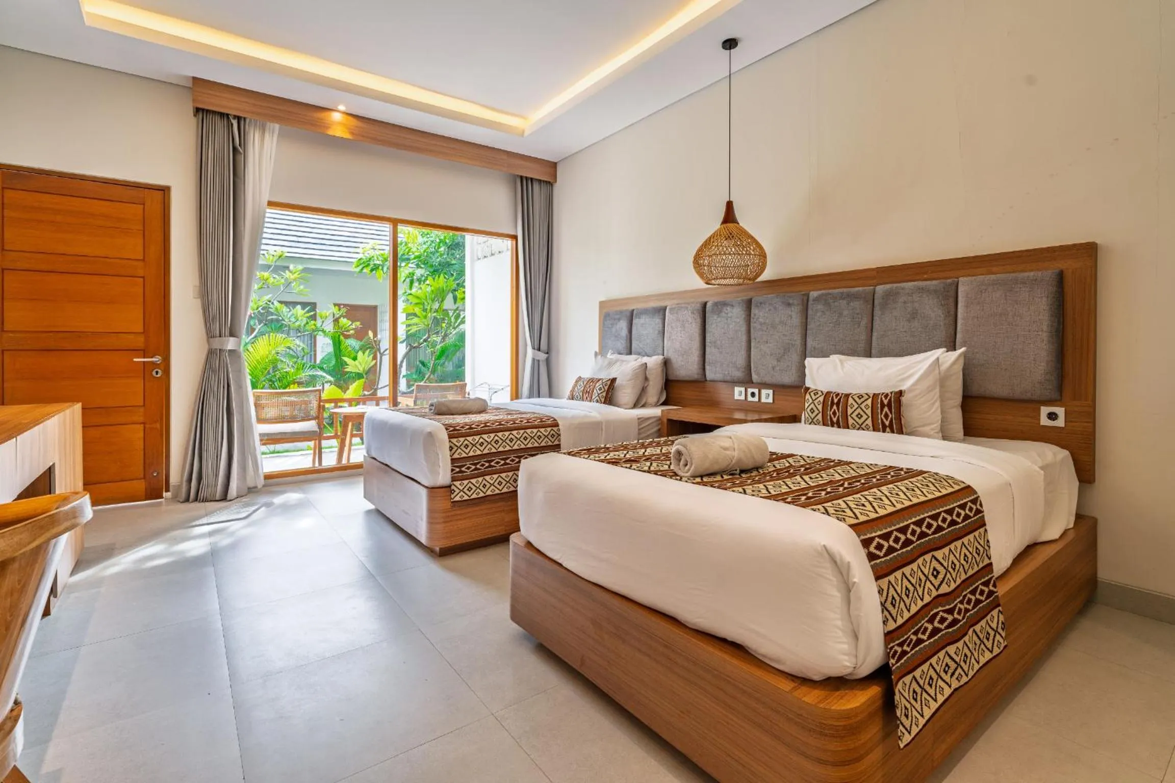 Bed in Casa Wina Kuta by The Wina Resorts