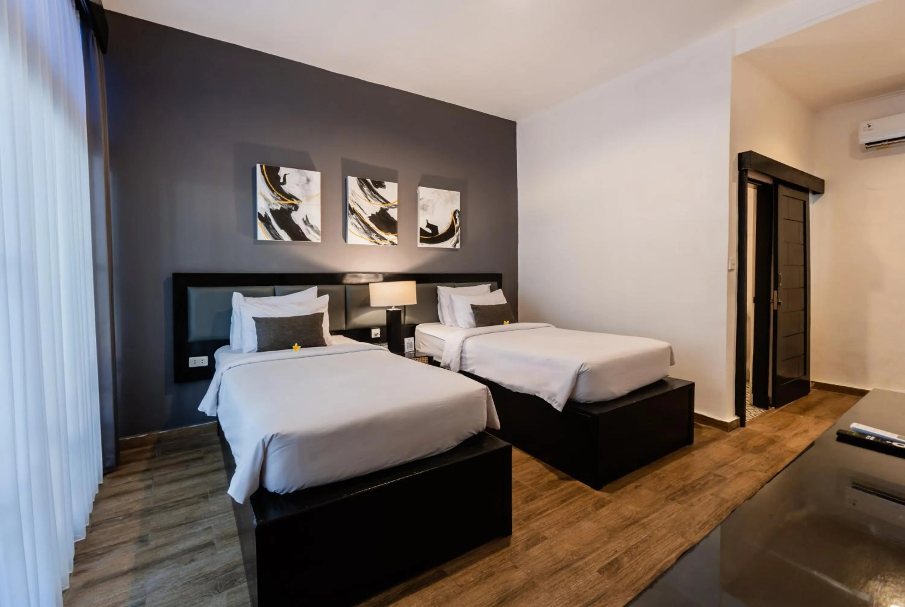 Bedroom, Bed in Casa Wina Kuta Managed by ARM Hospitality