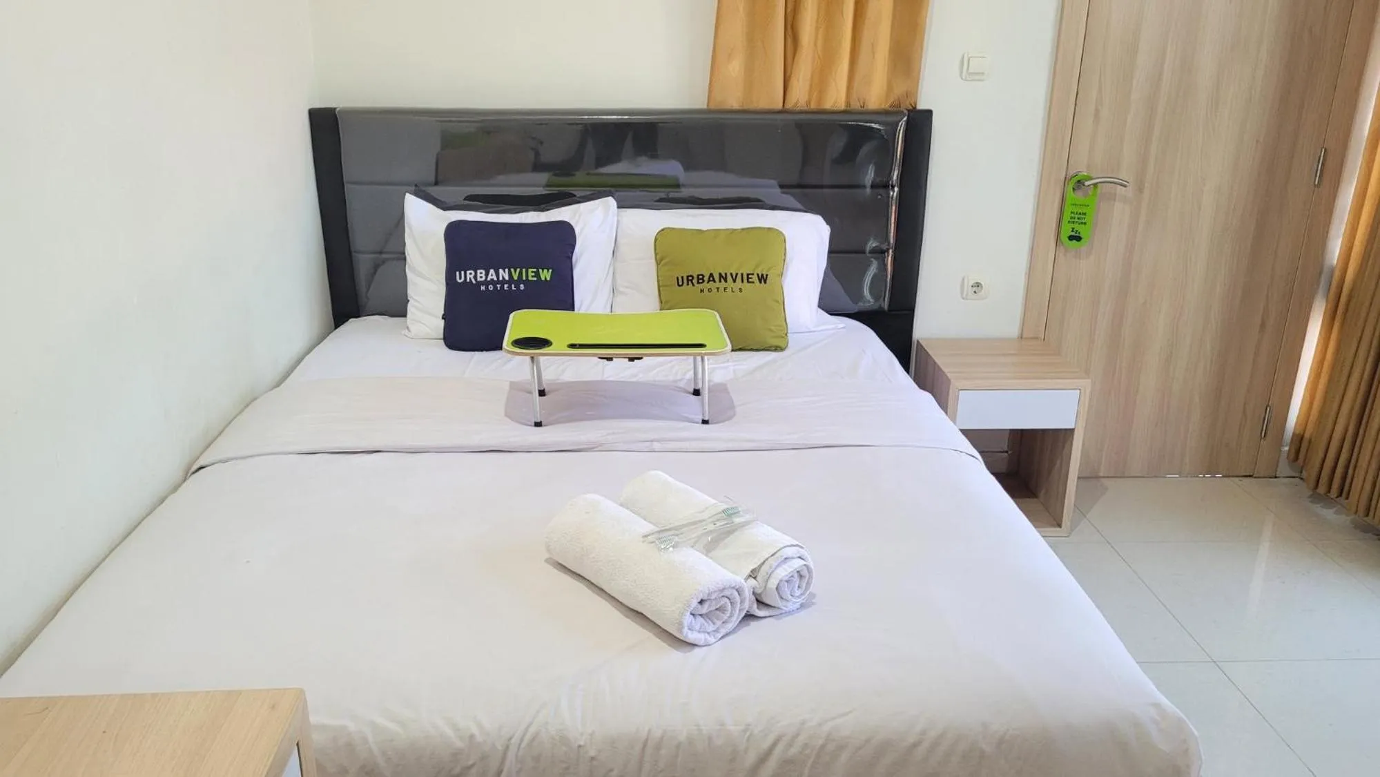Bed in Urbanview Le Reno Inn Wirobrajan by RedDoorz