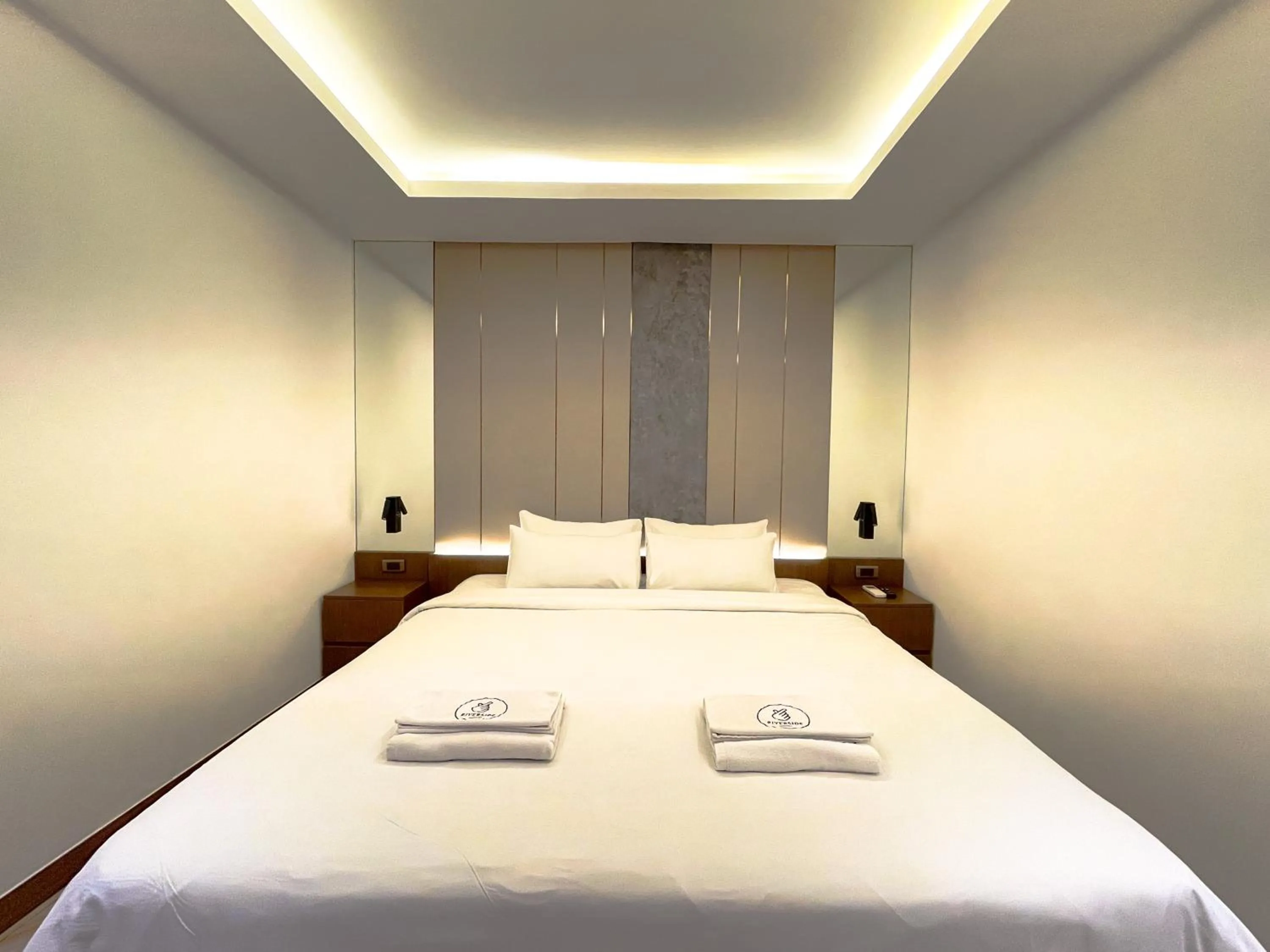 Bed in Riverside Hotel