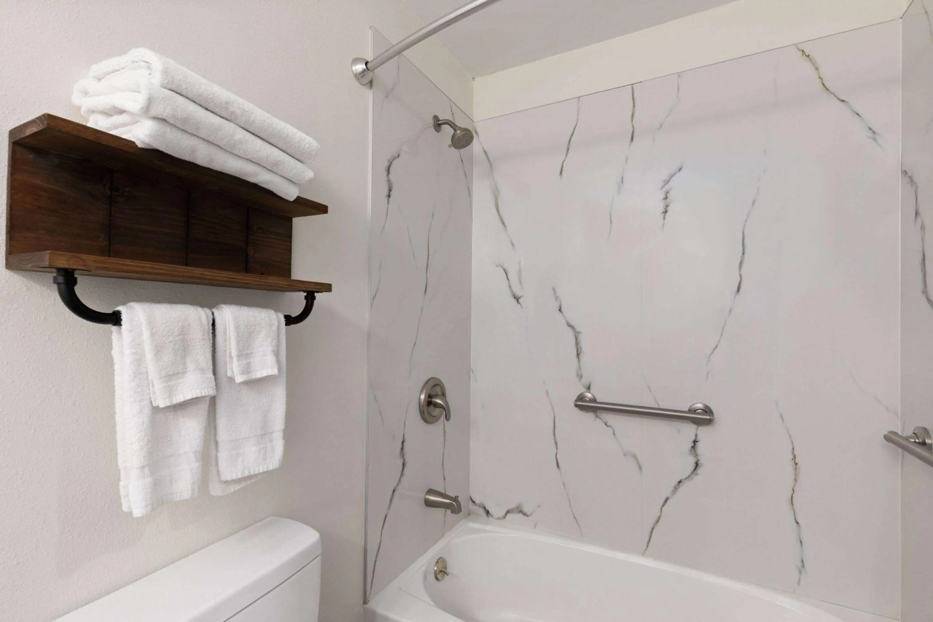 Bathroom in Ramada by Wyndham Studio Suites Dothan