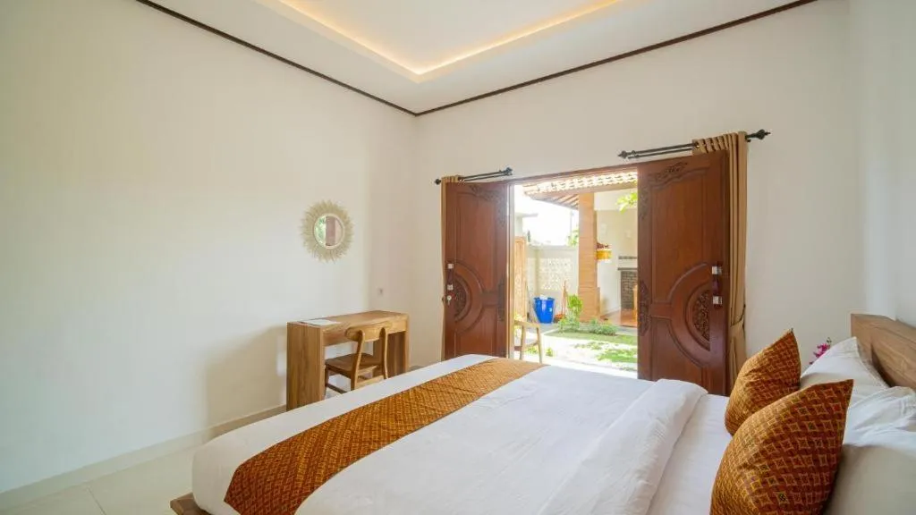 Bed in Bagas Bagus Guesthouse