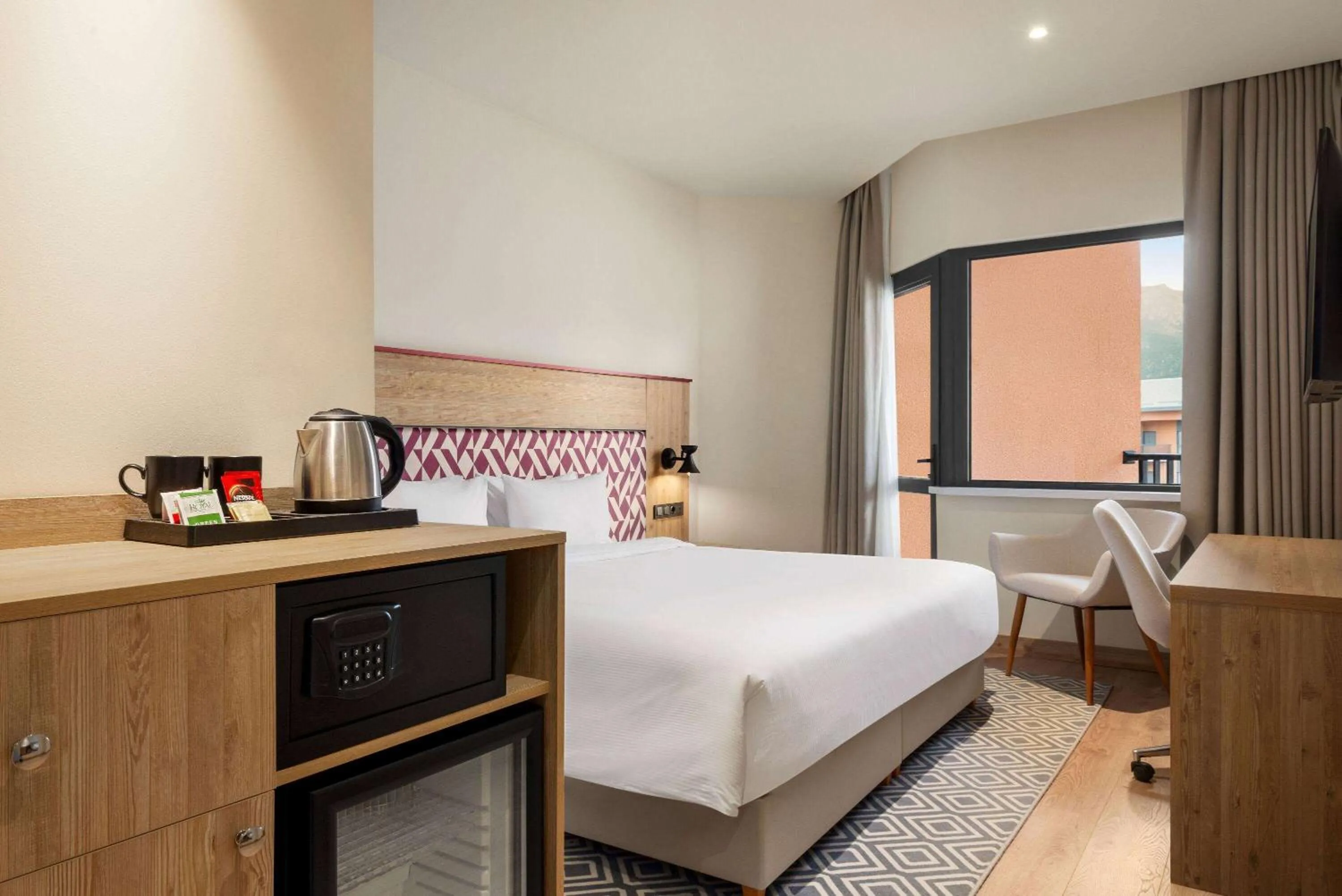 Photo of the whole room in Ramada Encore by Wyndham Zomin