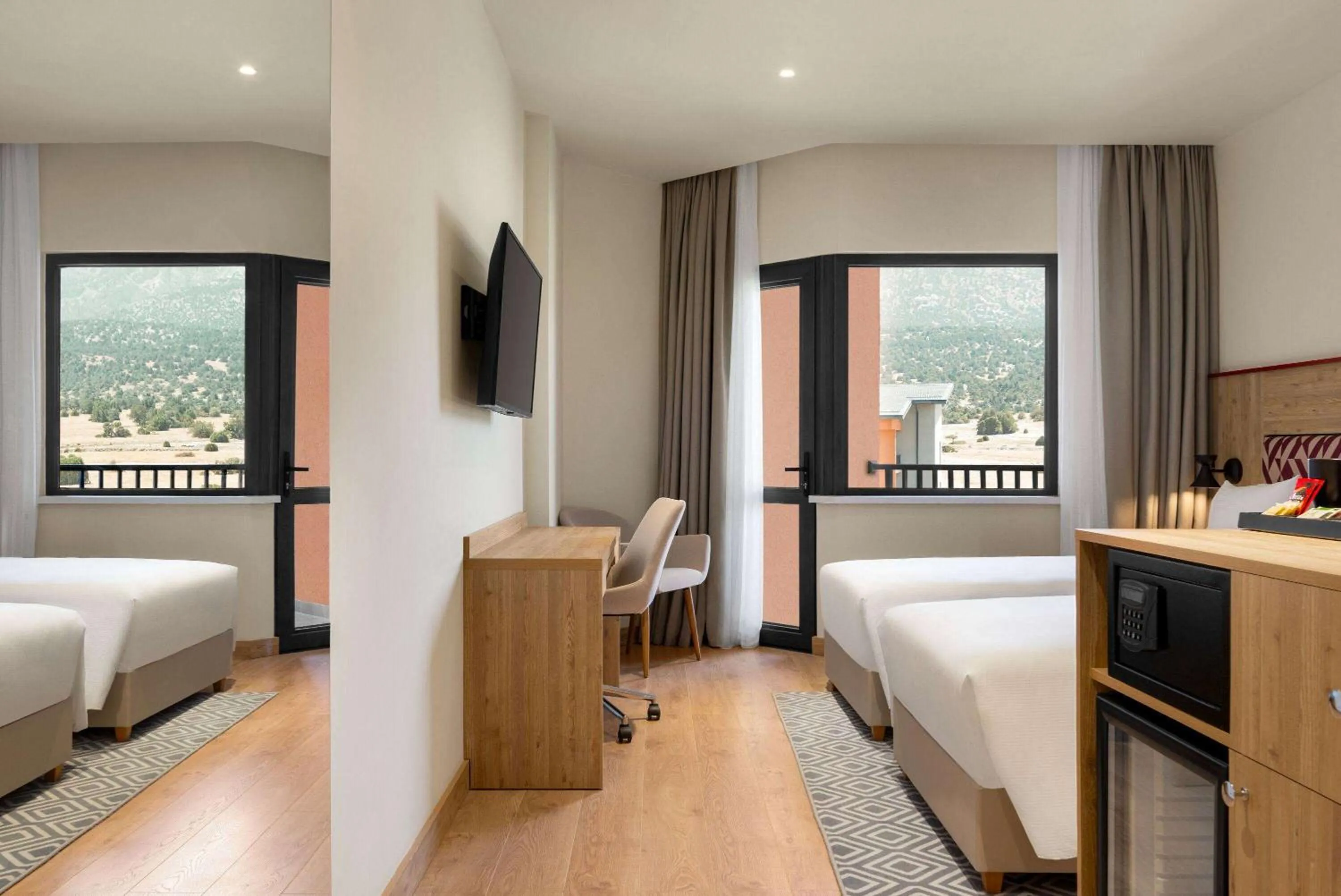 Photo of the whole room in Ramada Encore by Wyndham Zomin