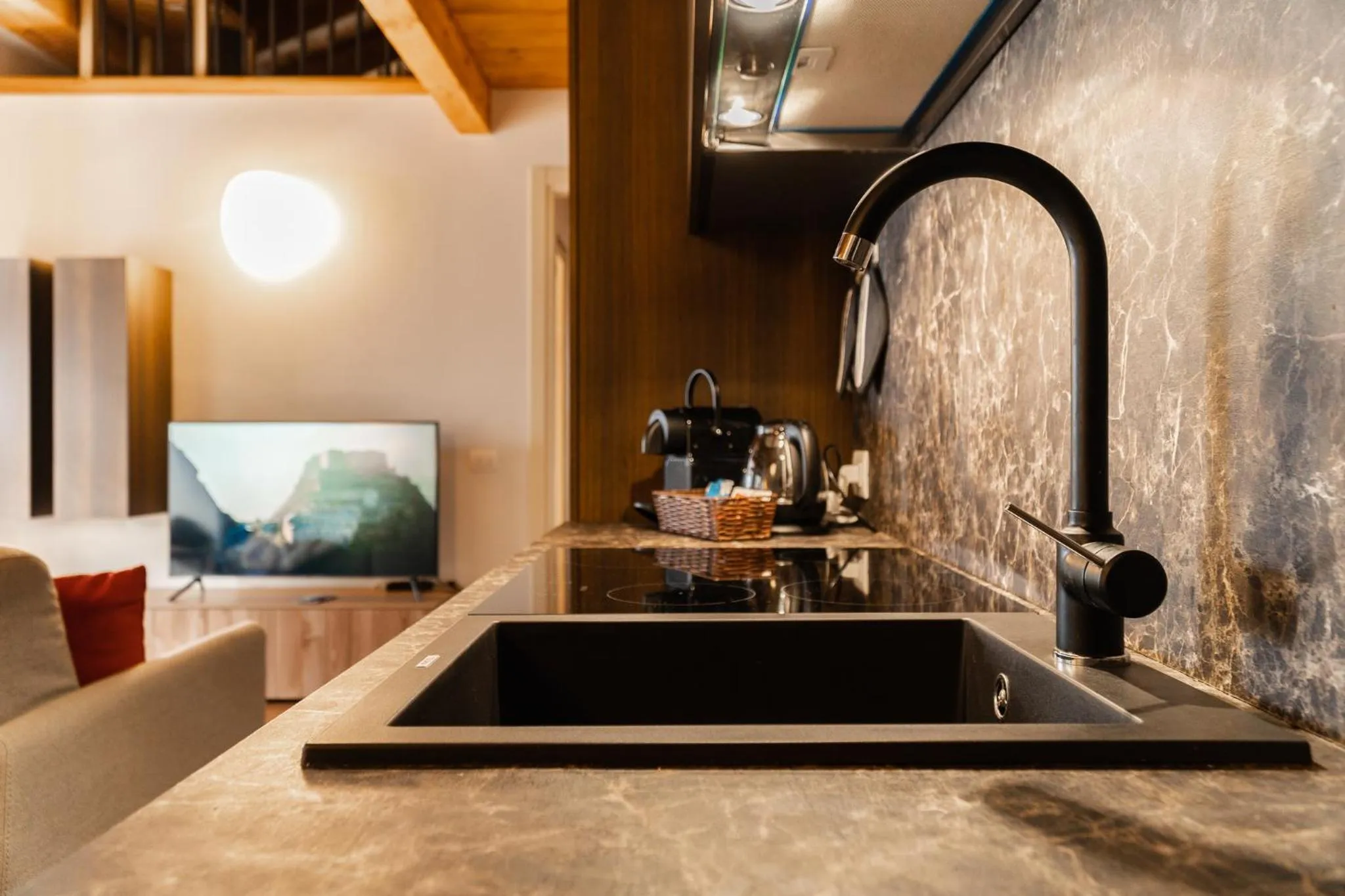 Kitchen or kitchenette in Maison Poluc hotel apartments