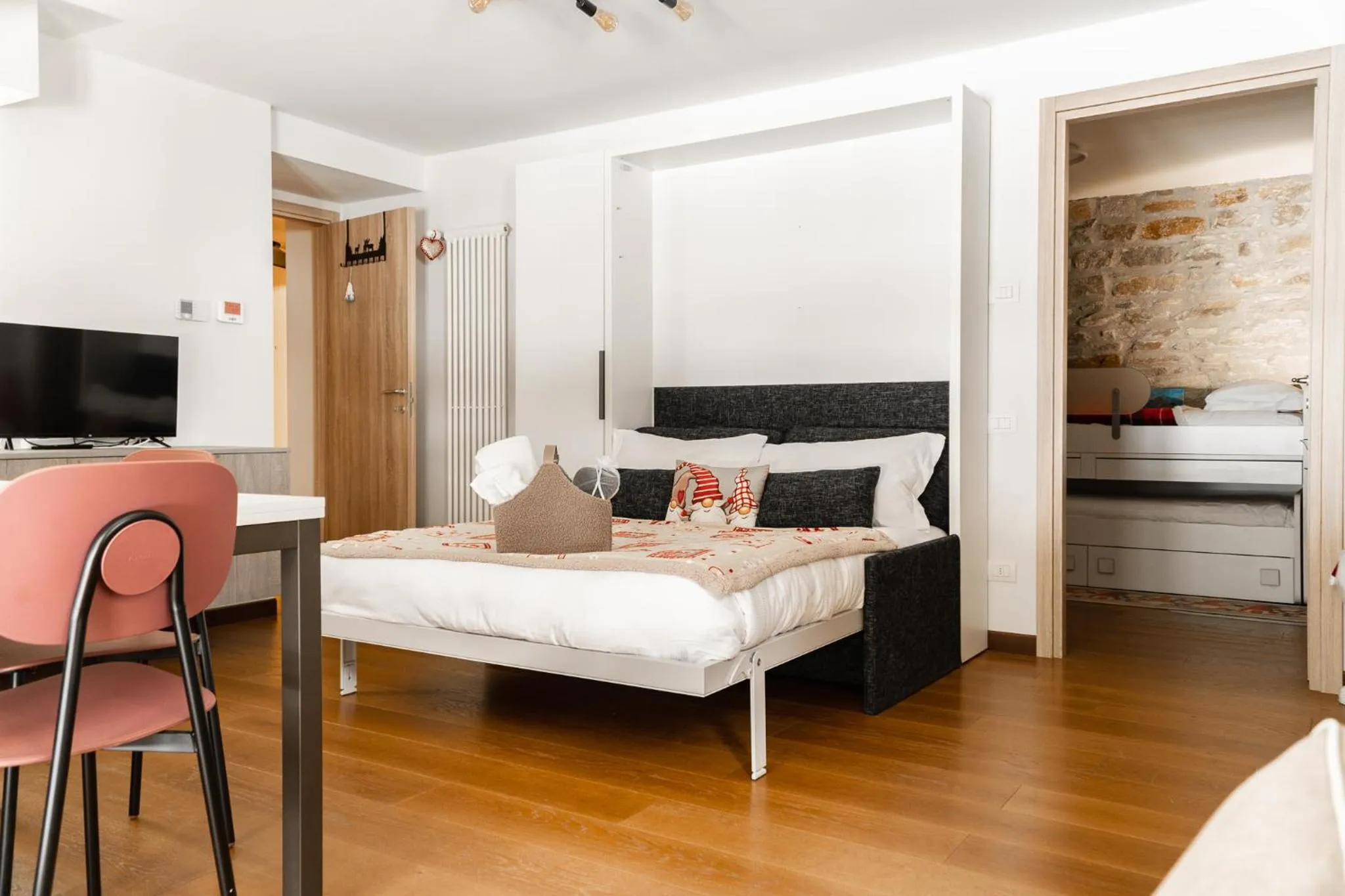 Bed in Maison Poluc hotel apartments