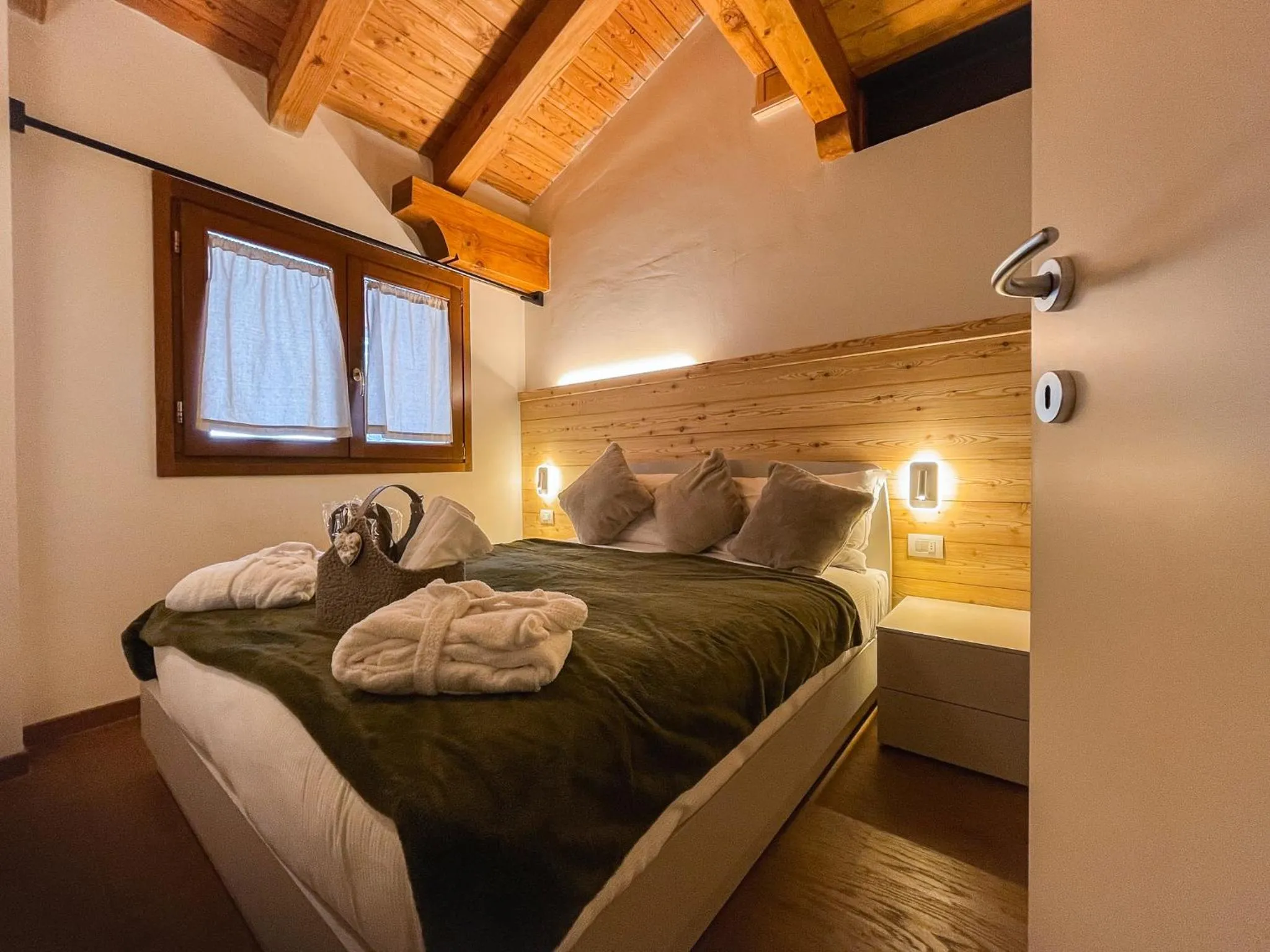 Bedroom in Maison Poluc hotel apartments