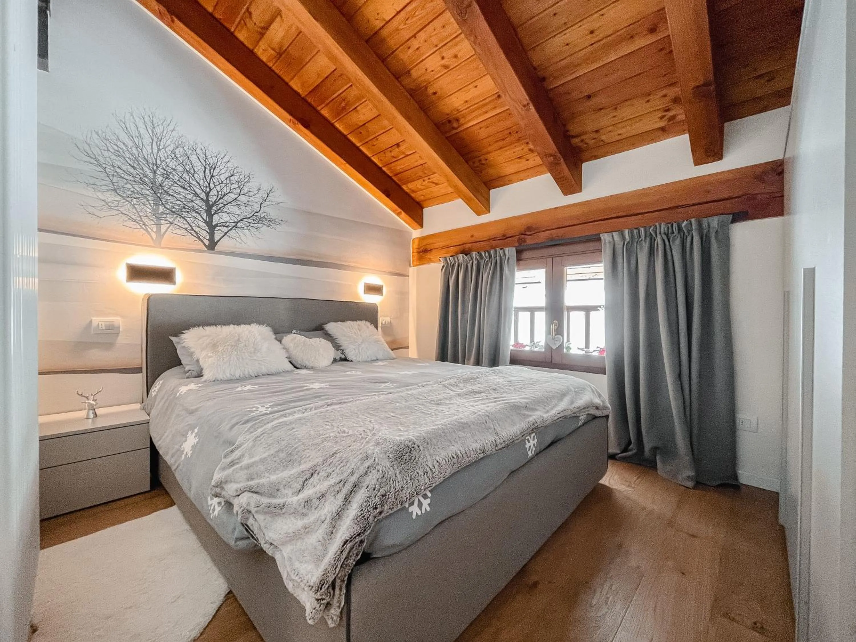 Bedroom in Maison Poluc hotel apartments