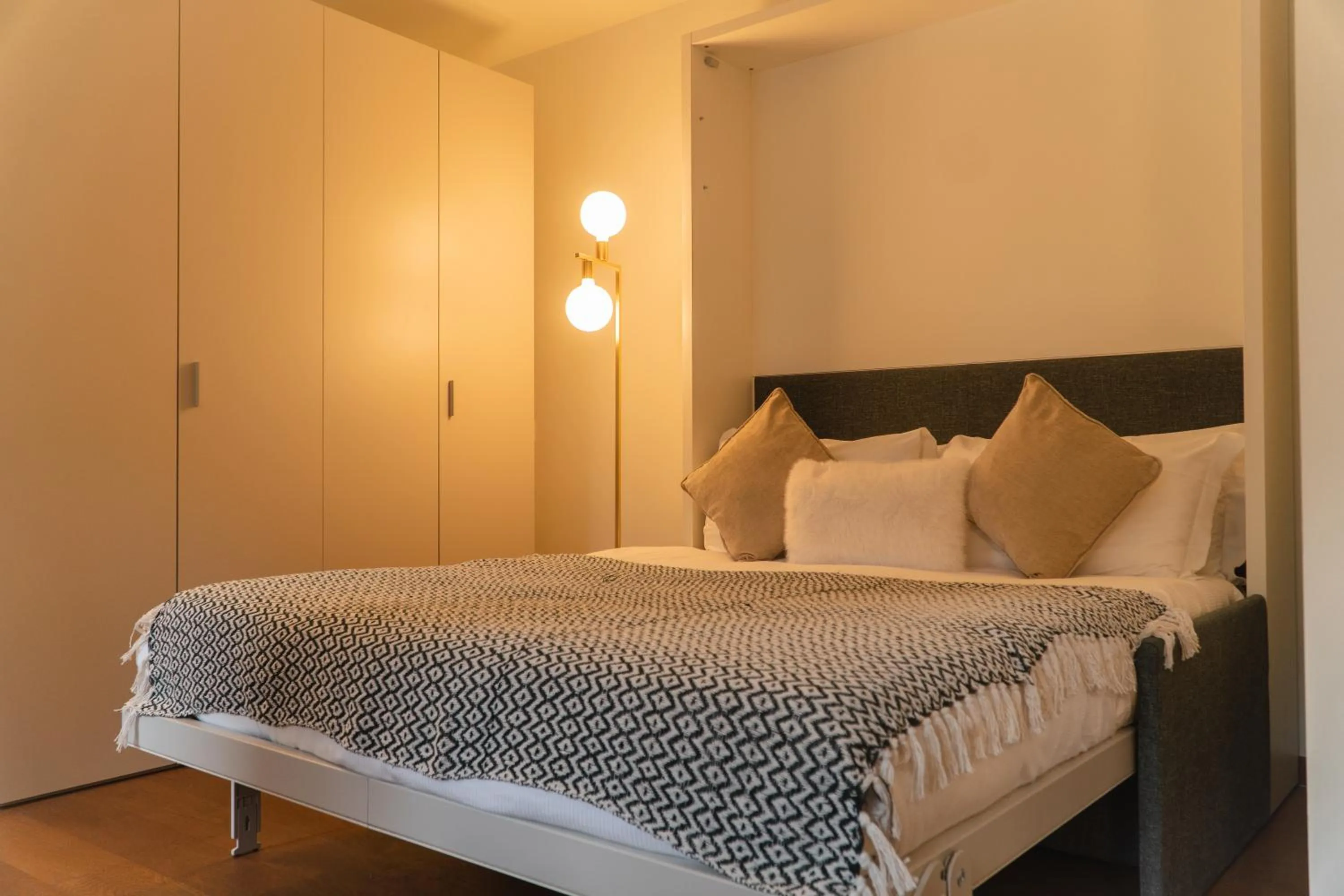 Bed in Maison Poluc hotel apartments