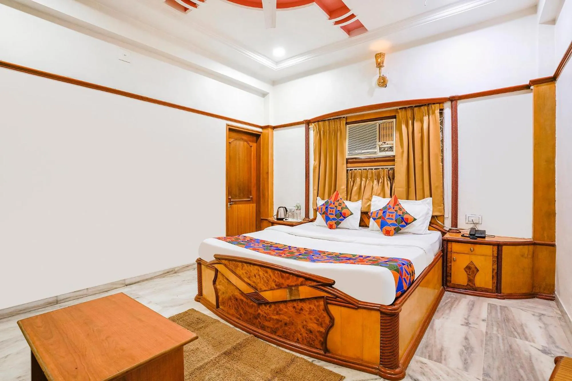 Bed in FabHotel Rest & Peace