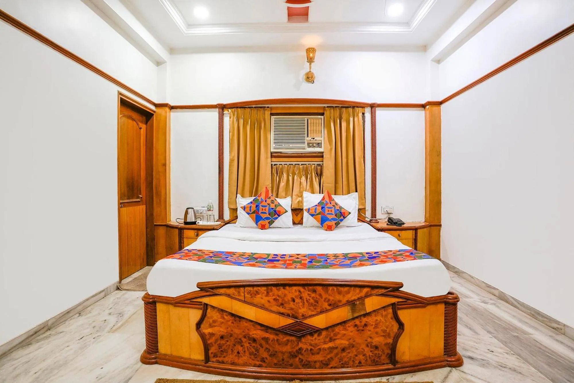 Bed in FabHotel Rest & Peace