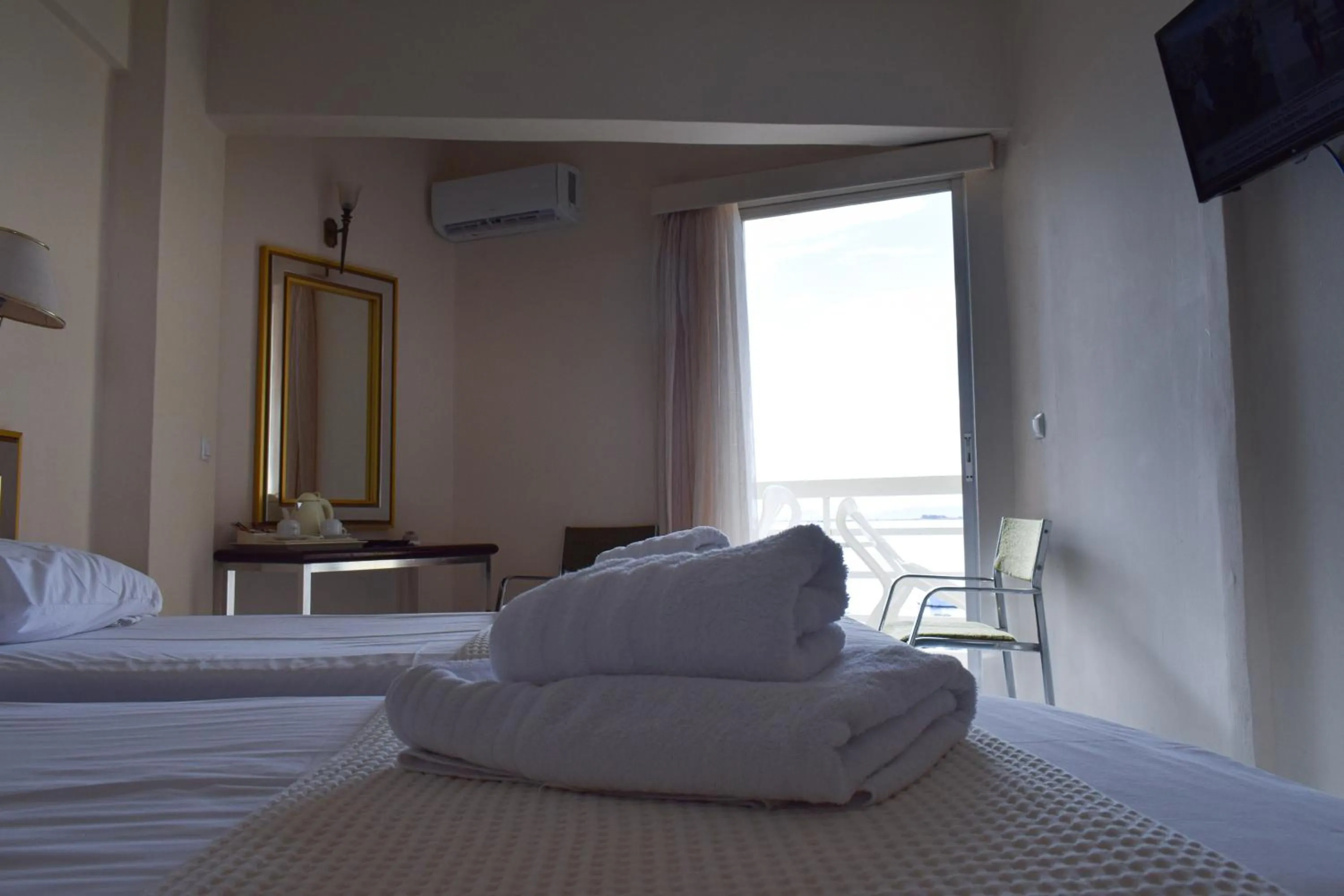 Bed in Hotel Theoxenia