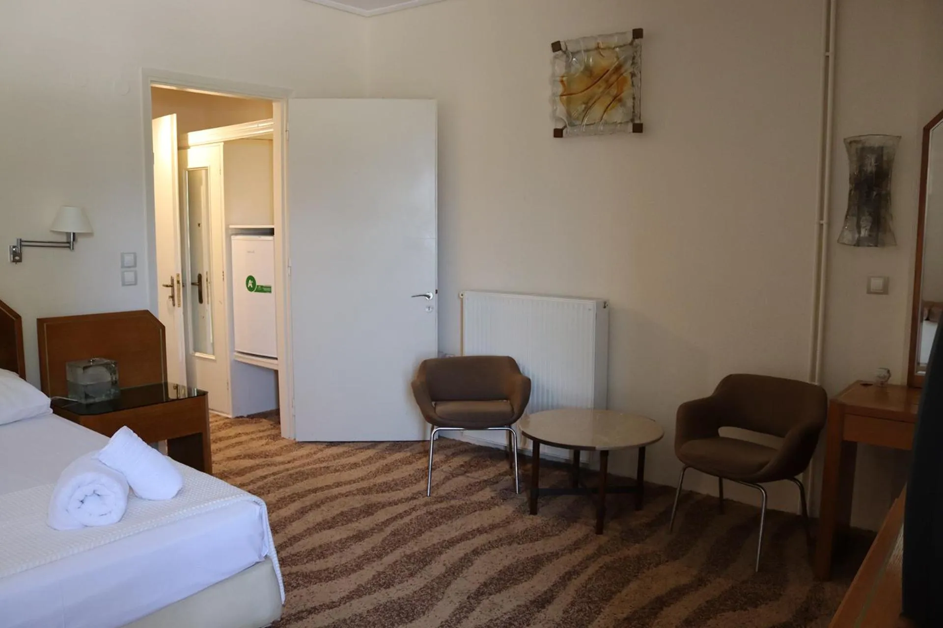 Bed in Hotel Theoxenia