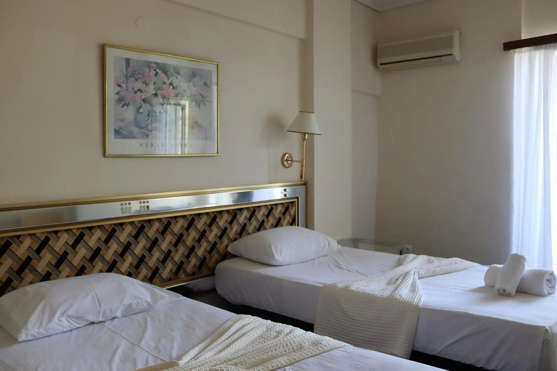 Bed in Hotel Theoxenia