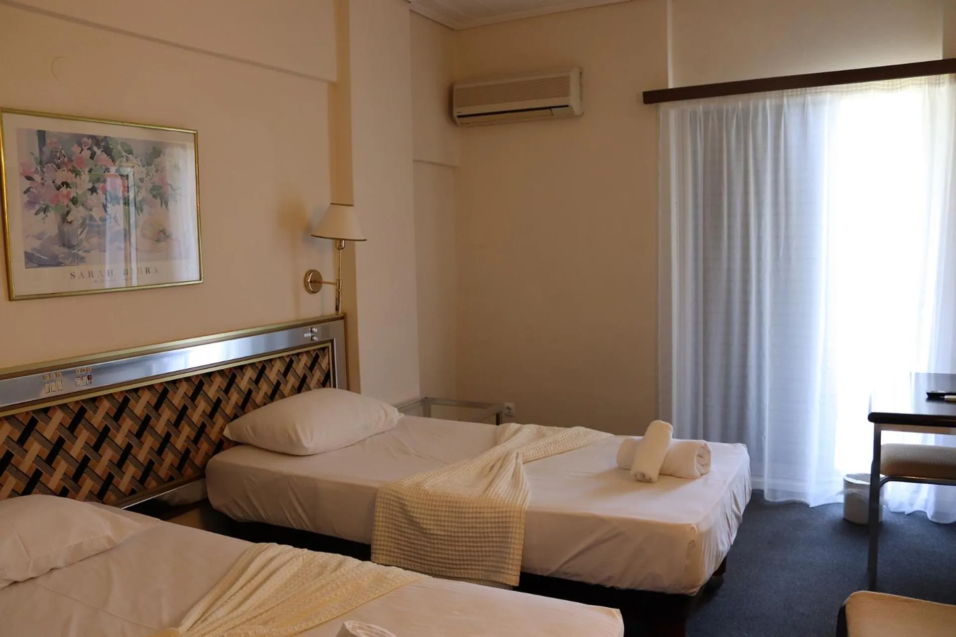 Bed in Hotel Theoxenia