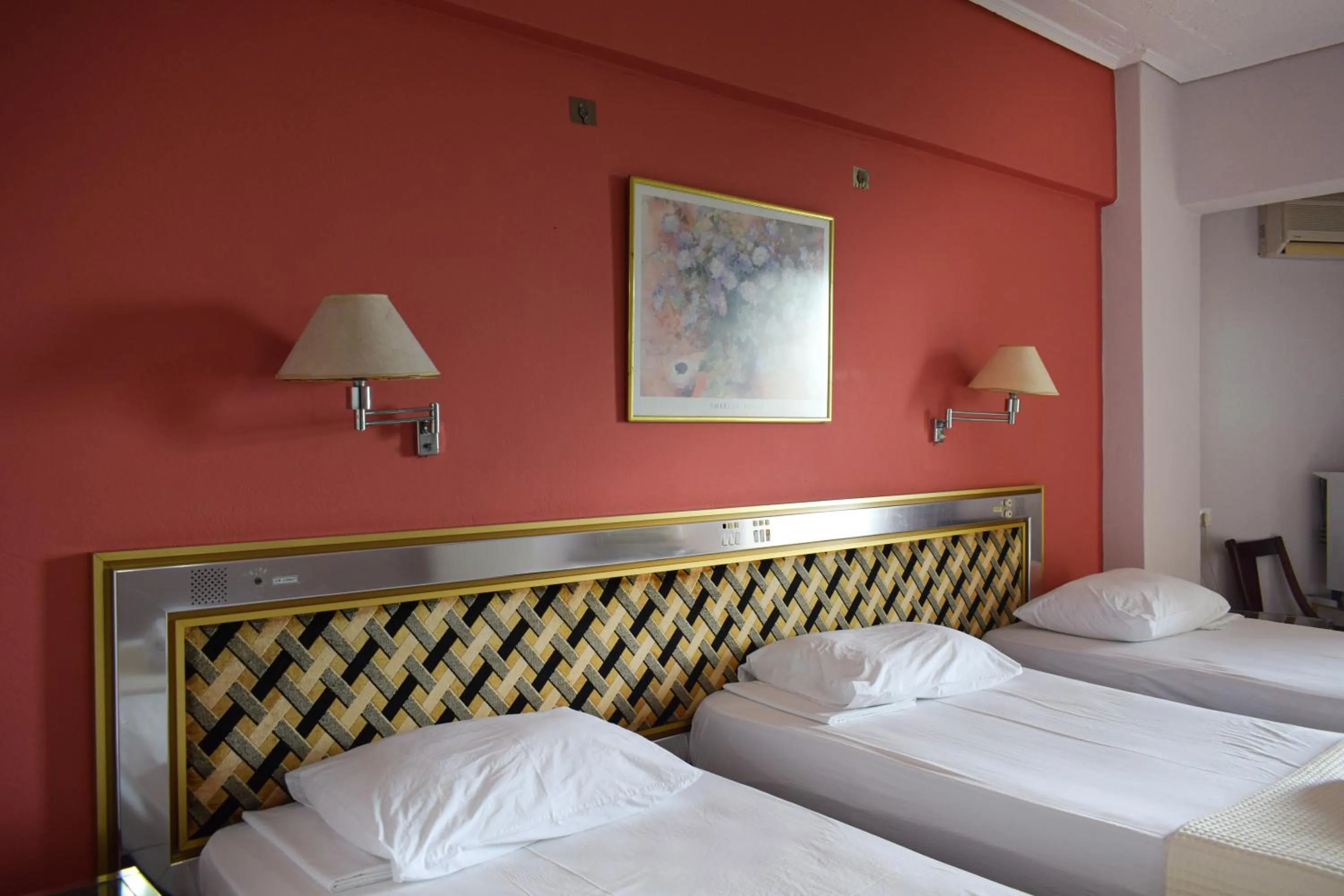 Bed in Hotel Theoxenia